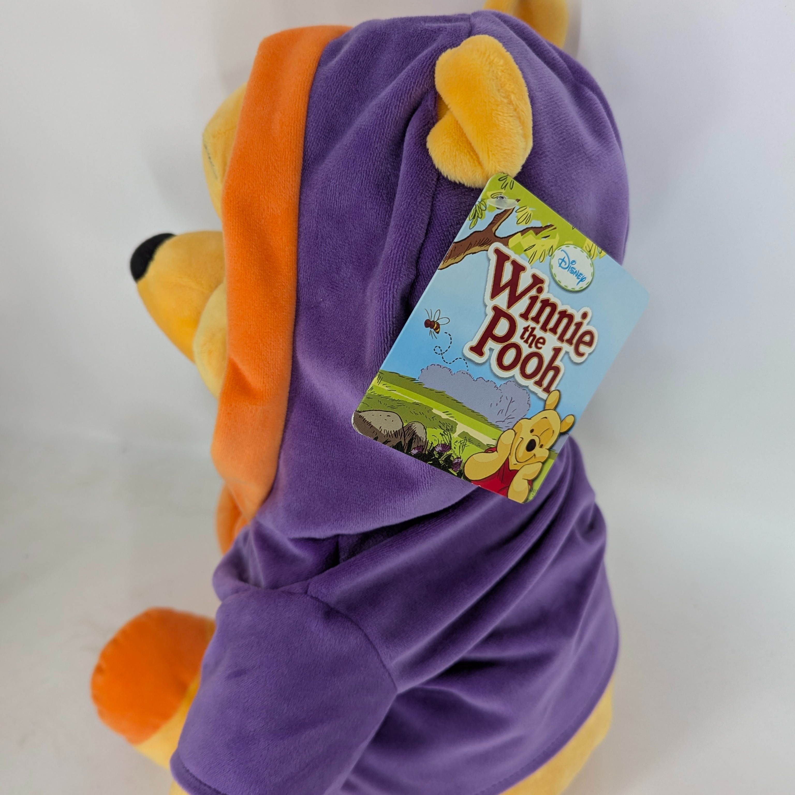 Voir photo 3 de Grande peluche WINNIE THE POOH avec peignoir violet 50 cm Grande peluche WINNIE THE POOH avec peignoir violet 50 cm - Vue 3 -