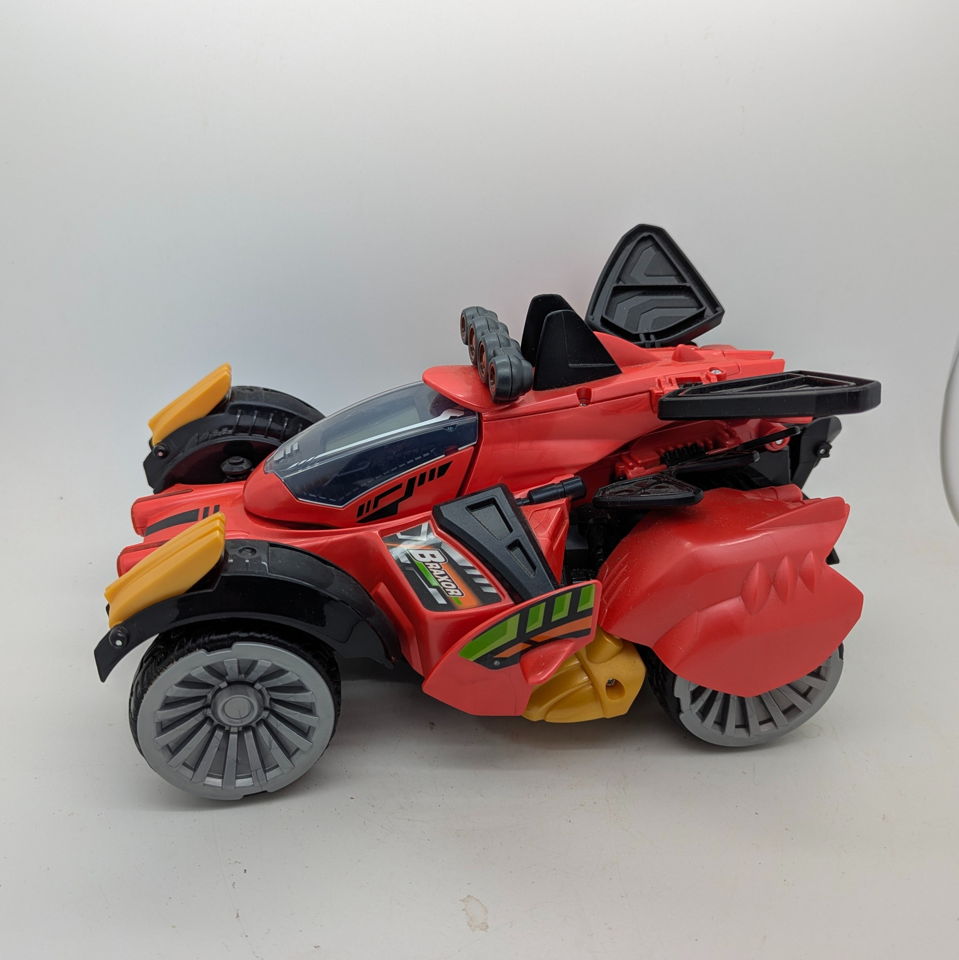 Buggy VTECH switch & GO DINOS Robot interactif radiocommandé Braxor le méga Stégosaure transformable en buggy Très bon état - Vue 2 - 