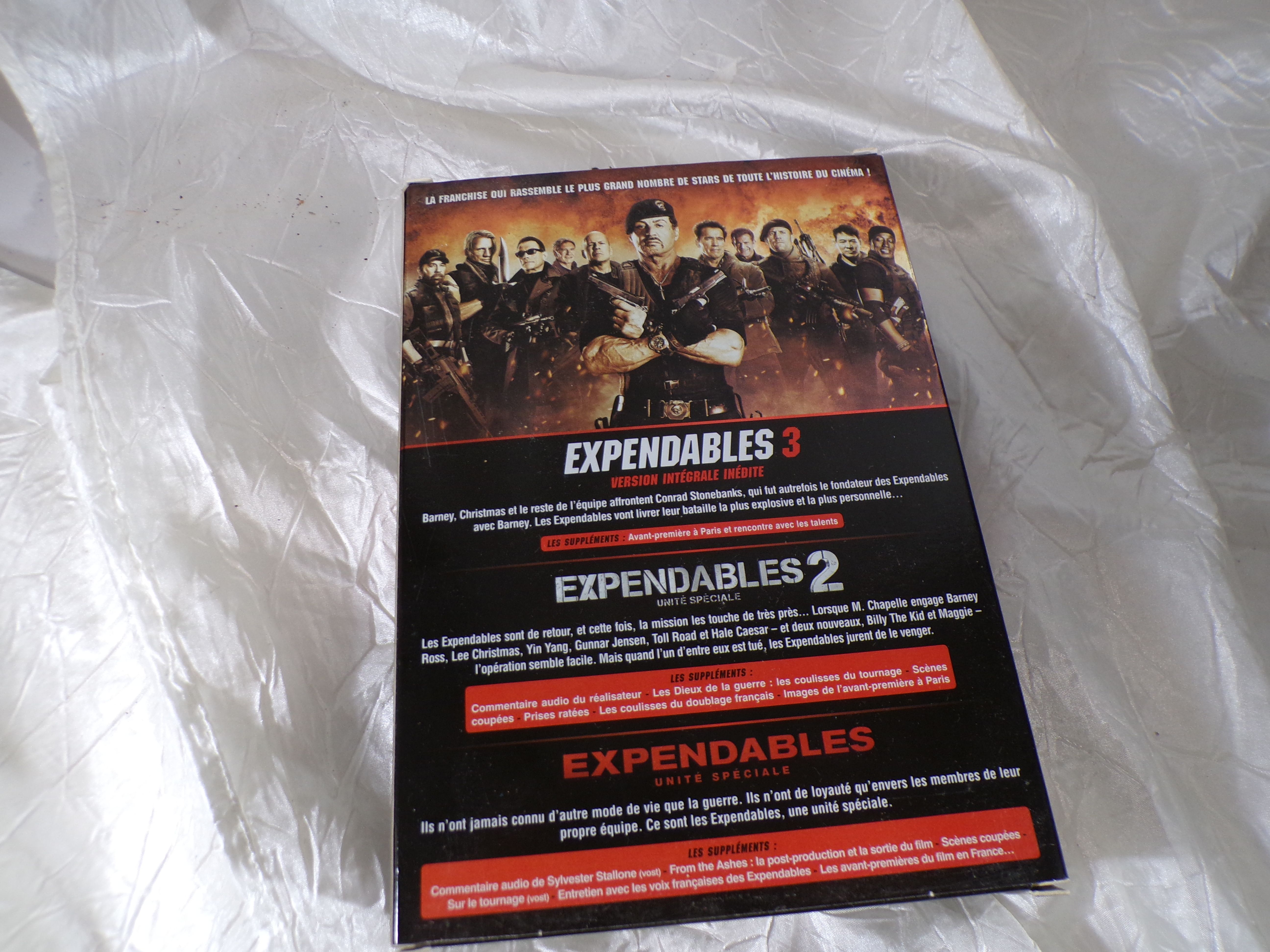 Voir photo 2 de Coffret DVD "la Trilogie Expendables" Coffret DVD "la Trilogie Expendables" Très bon état - Vue 2 -