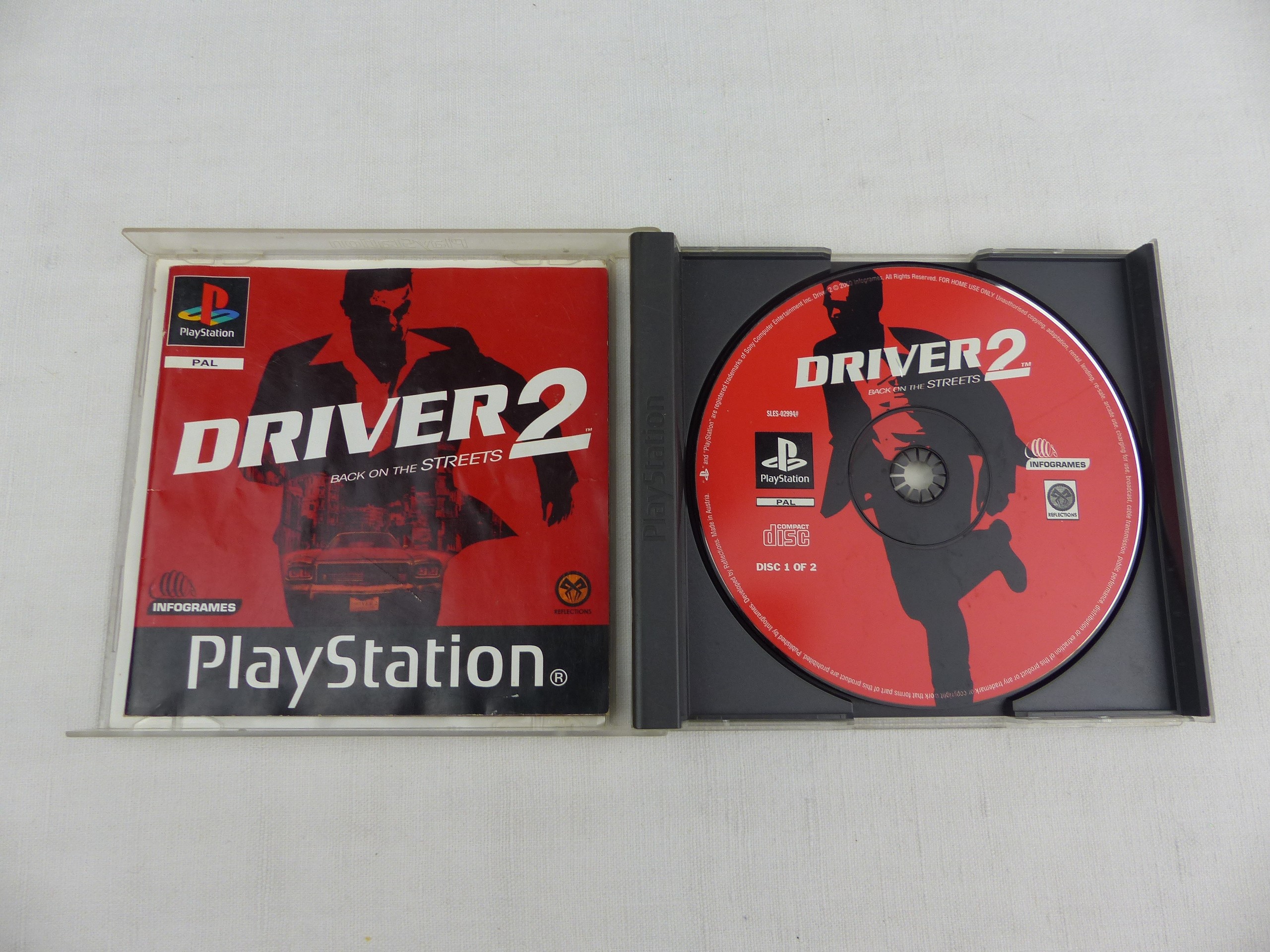 Voir photo 4 de Driver 2 Back On The Streets PS1 PlayStation Complet 2 Disques PAL FR Driver 2 Back On The Streets PS1 PlayStation Complet 2 Disques PAL FR État correct - Vue 4 -