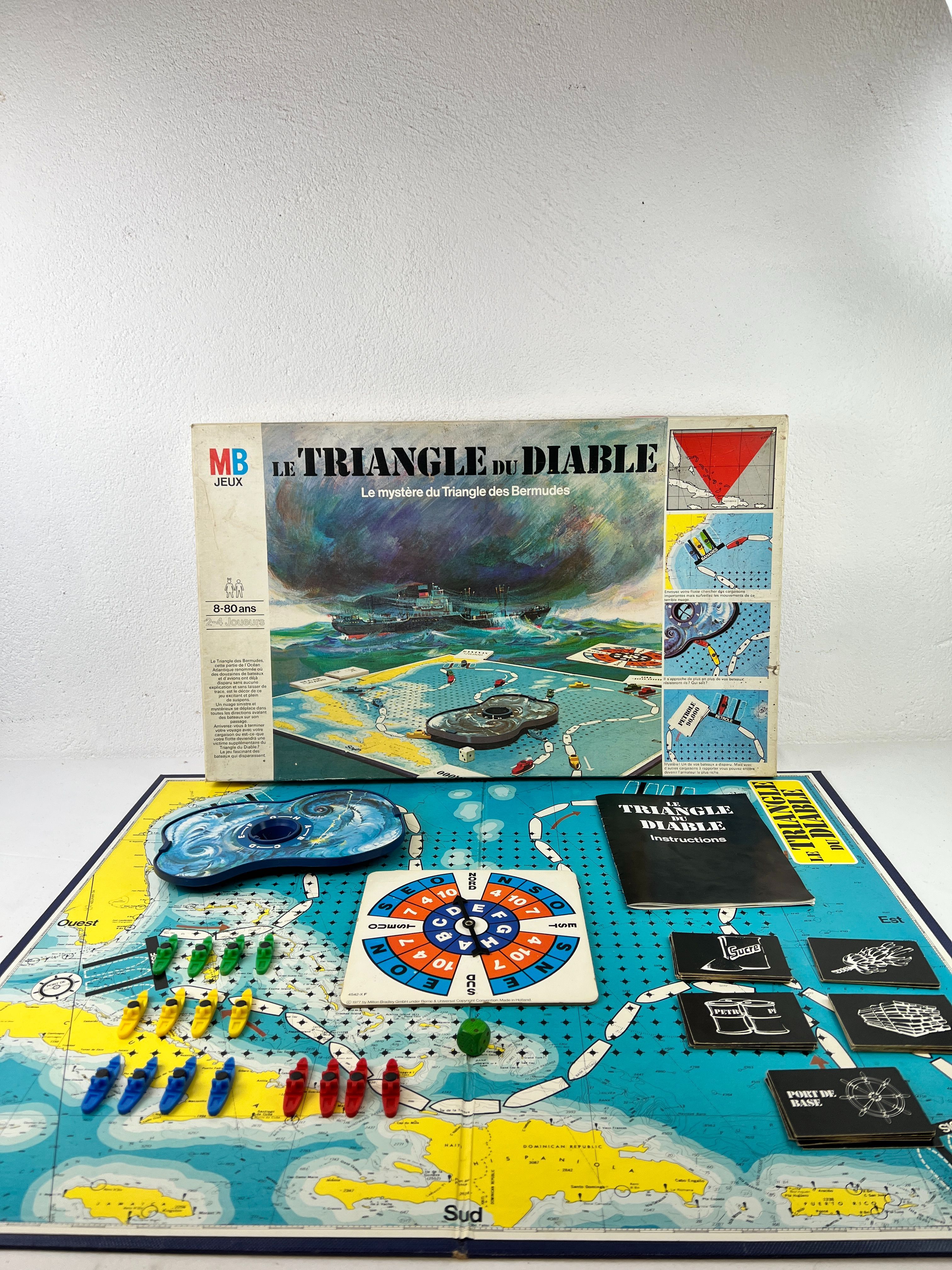 Voir photo 2 de Le triangle du diable MB 1977 Le triangle du diable MB 1977 Très bon état - Vue 2 -