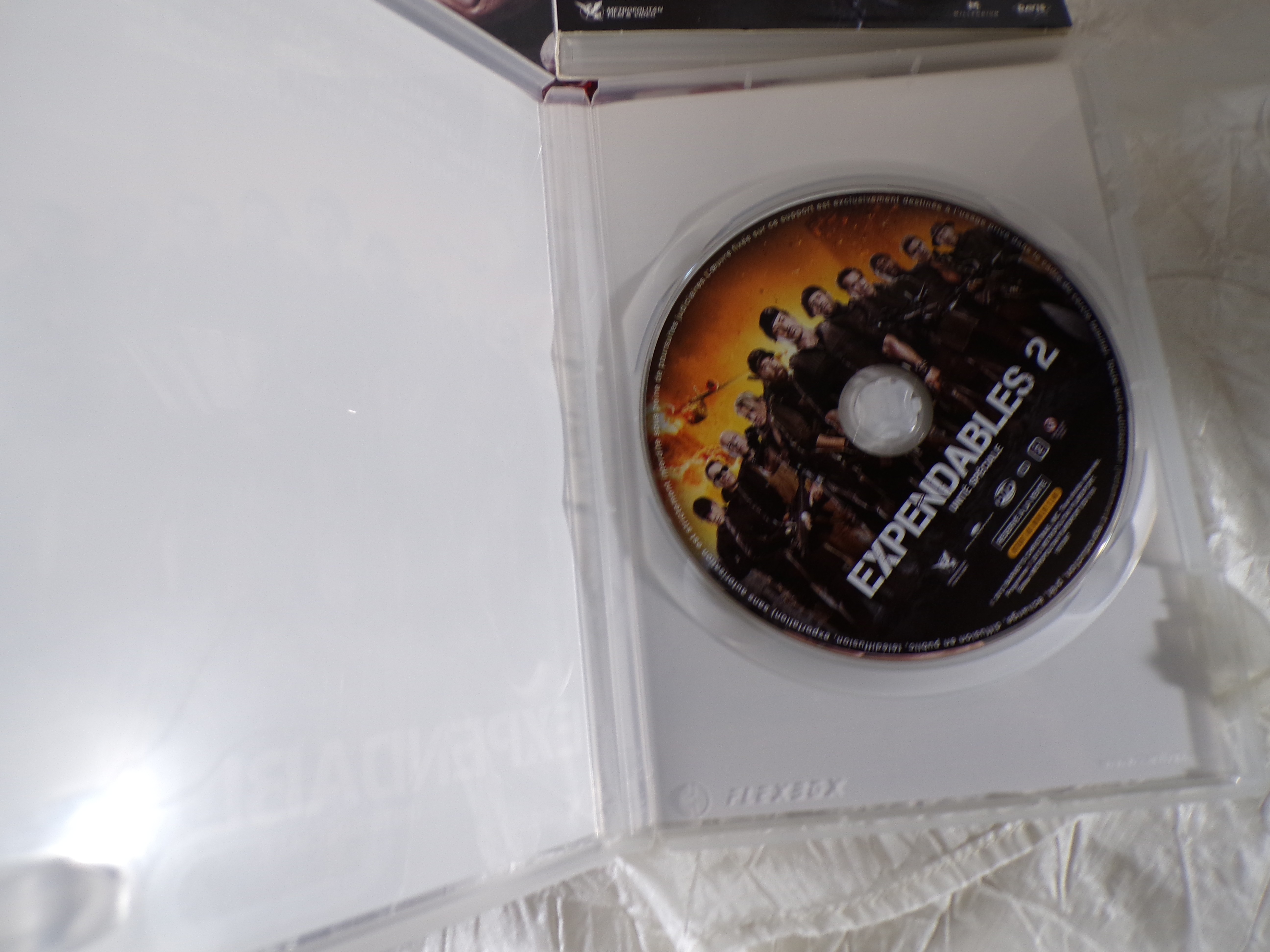 Voir photo 3 de Coffret DVD "la Trilogie Expendables" Coffret DVD "la Trilogie Expendables" Très bon état - Vue 3 -