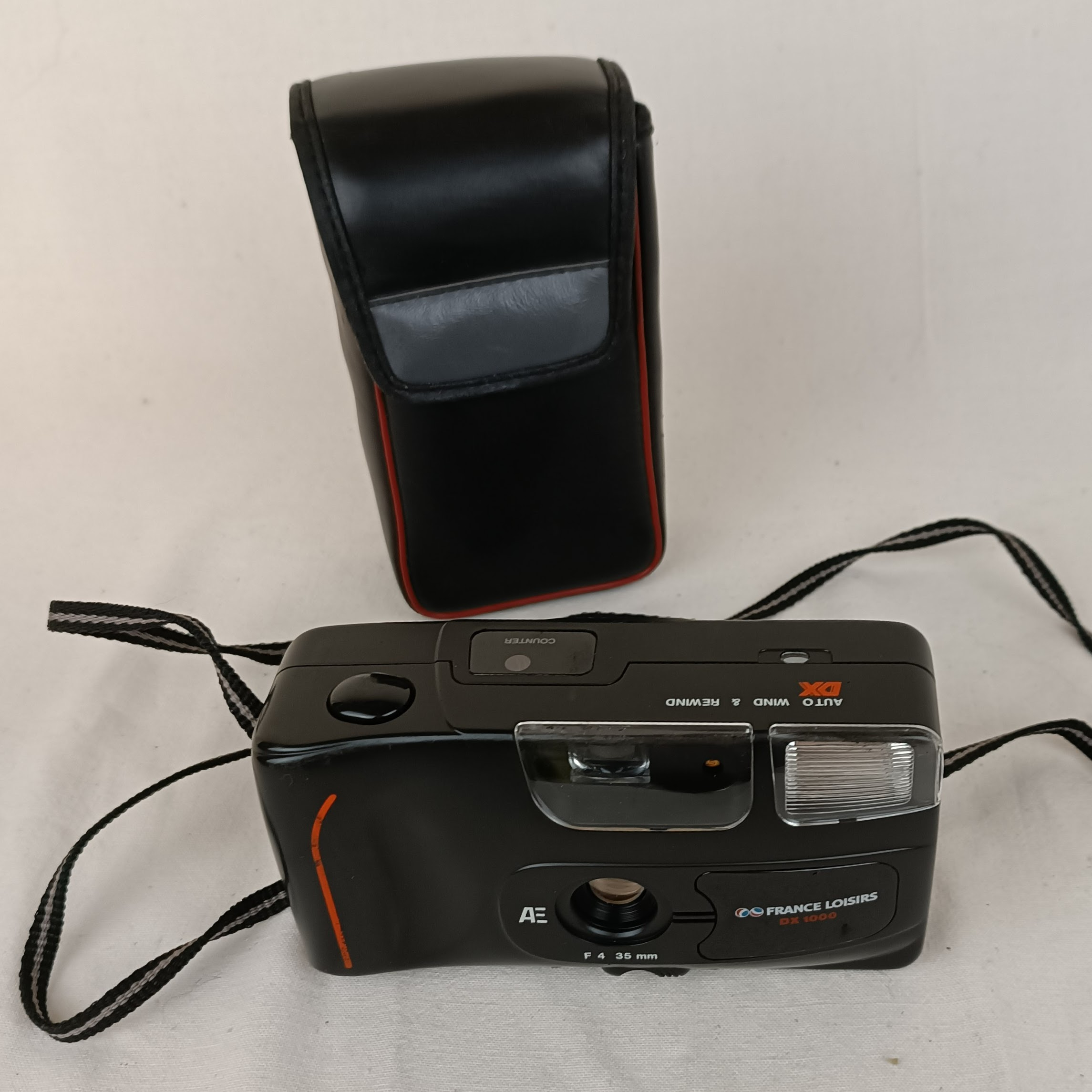 Appareil photo argentique France Loisir DX 1000, avec son étui État correct - Vue 4 - 