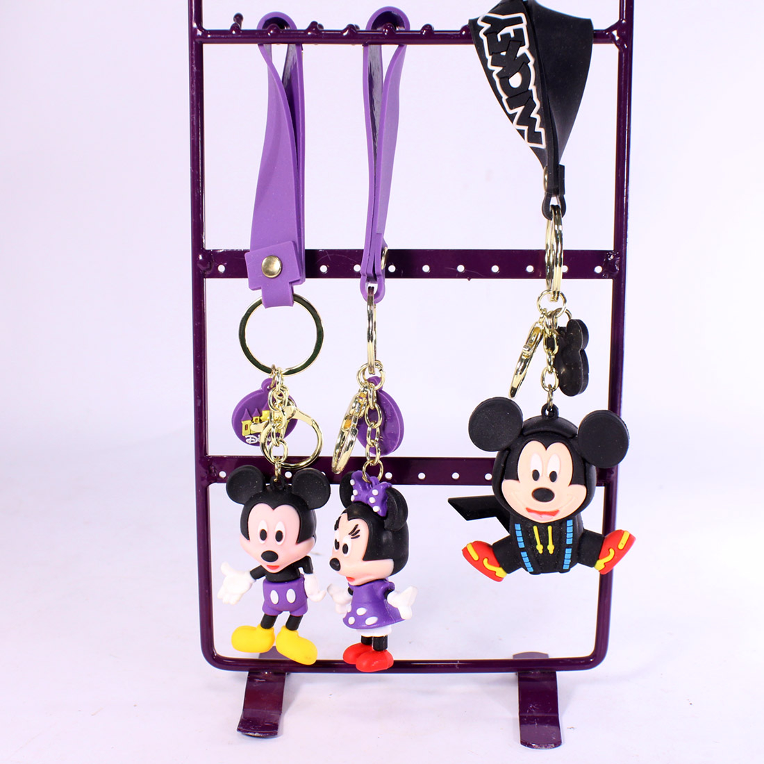 Voir photo 2 de Lot de porte-clefs Disney pour sac Lot de porte-clefs Disney pour sac Bon état - Vue 2 -