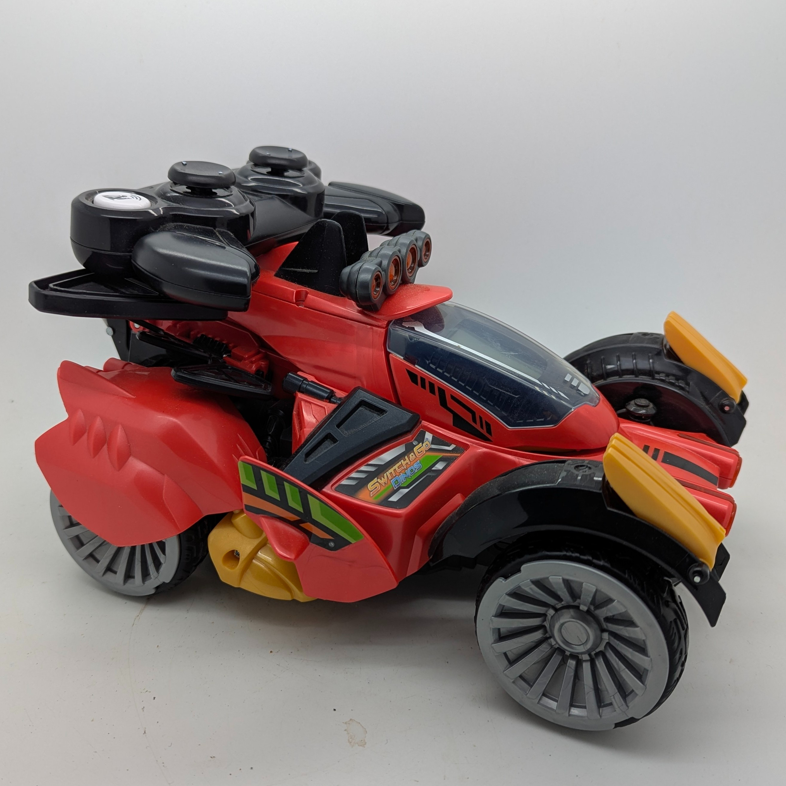 Buggy VTECH switch & GO DINOS Robot interactif radiocommandé Braxor le méga Stégosaure transformable en buggy Très bon état - Vue 3 - 