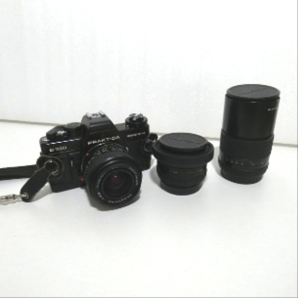 Voir photo 5 de Appareil photo argentique Praktica B100 electronic + 3 objectifs Appareil photo argentique Praktica B100 electronic + 3 objectifs Bon état - Vue 5 -