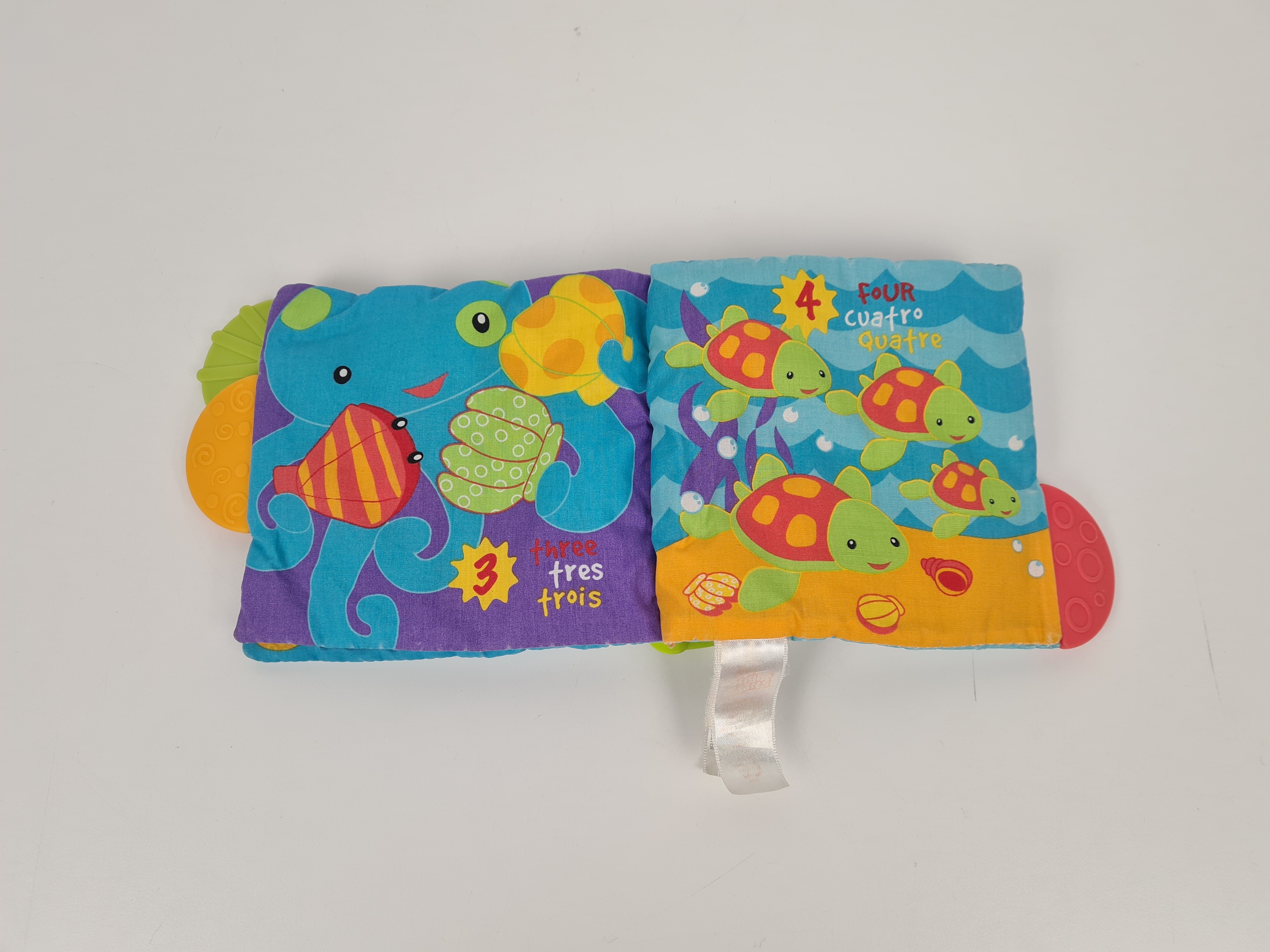 Jeu d'éveil - Livre en tissu avec anneaux de dentition Soleil - 0/3 ans - Photo 1