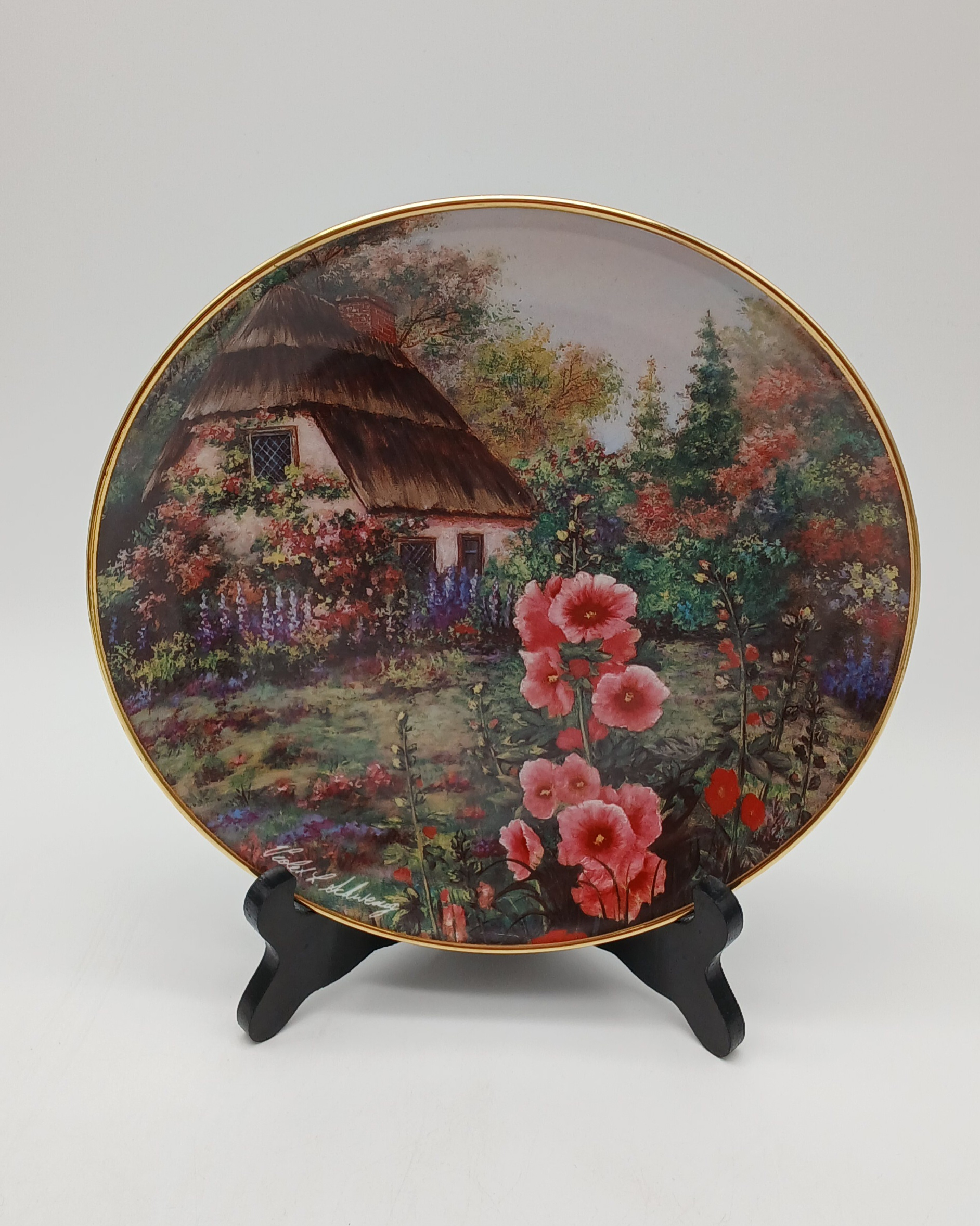 Assiette décorative en porcelaine fine Franklin Mint "Hollyhock Cottage" par Violet L. Schwenig, Edition limitée, années 1970-1990 Très bon état - Vue 2 - 