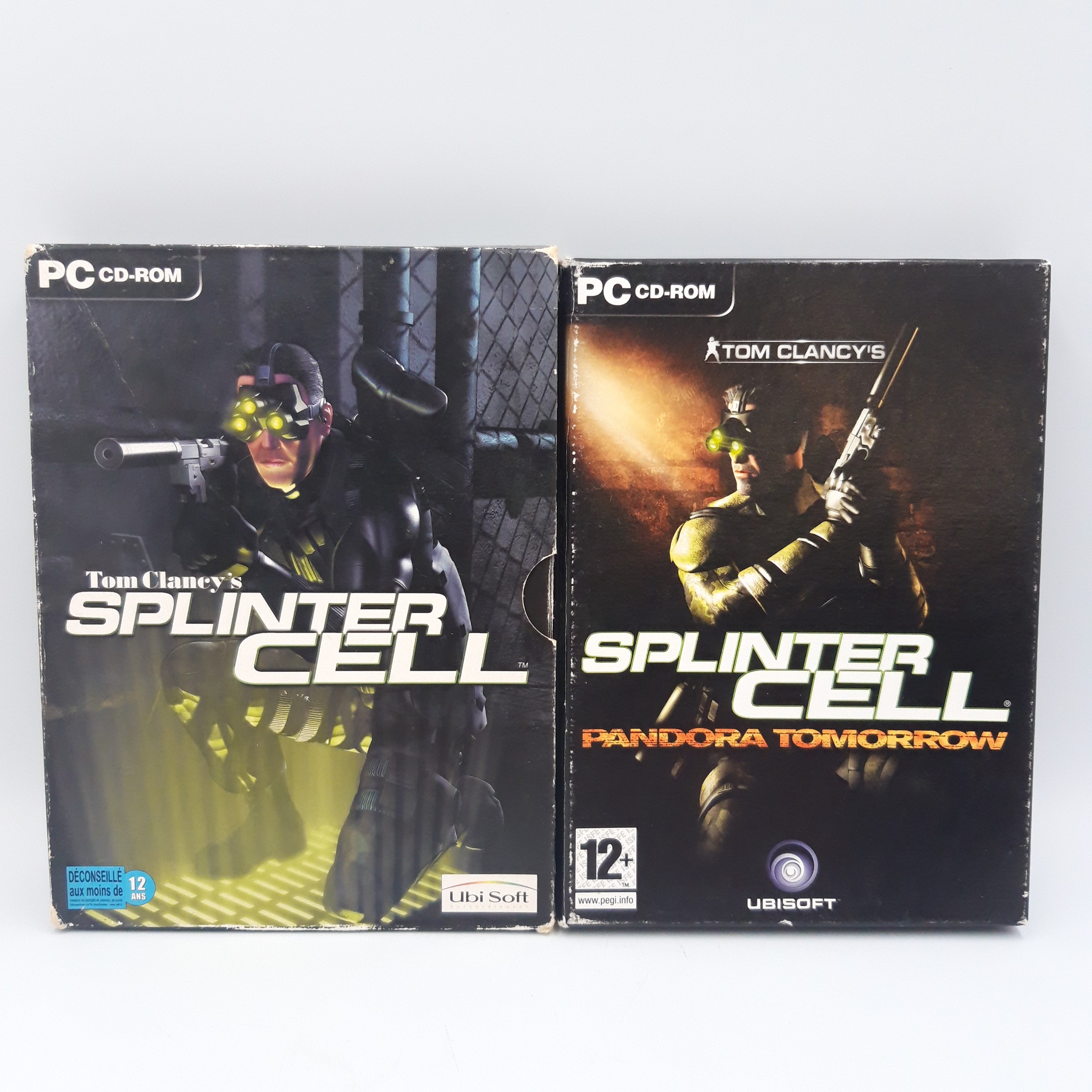 Lot de deux cd de jeux pour ordinateur 1. Tom clancy's splinter cell Pandora Tomorrow 2. Tom clancy's splinter cell - Bon état sur Label Emmaüs