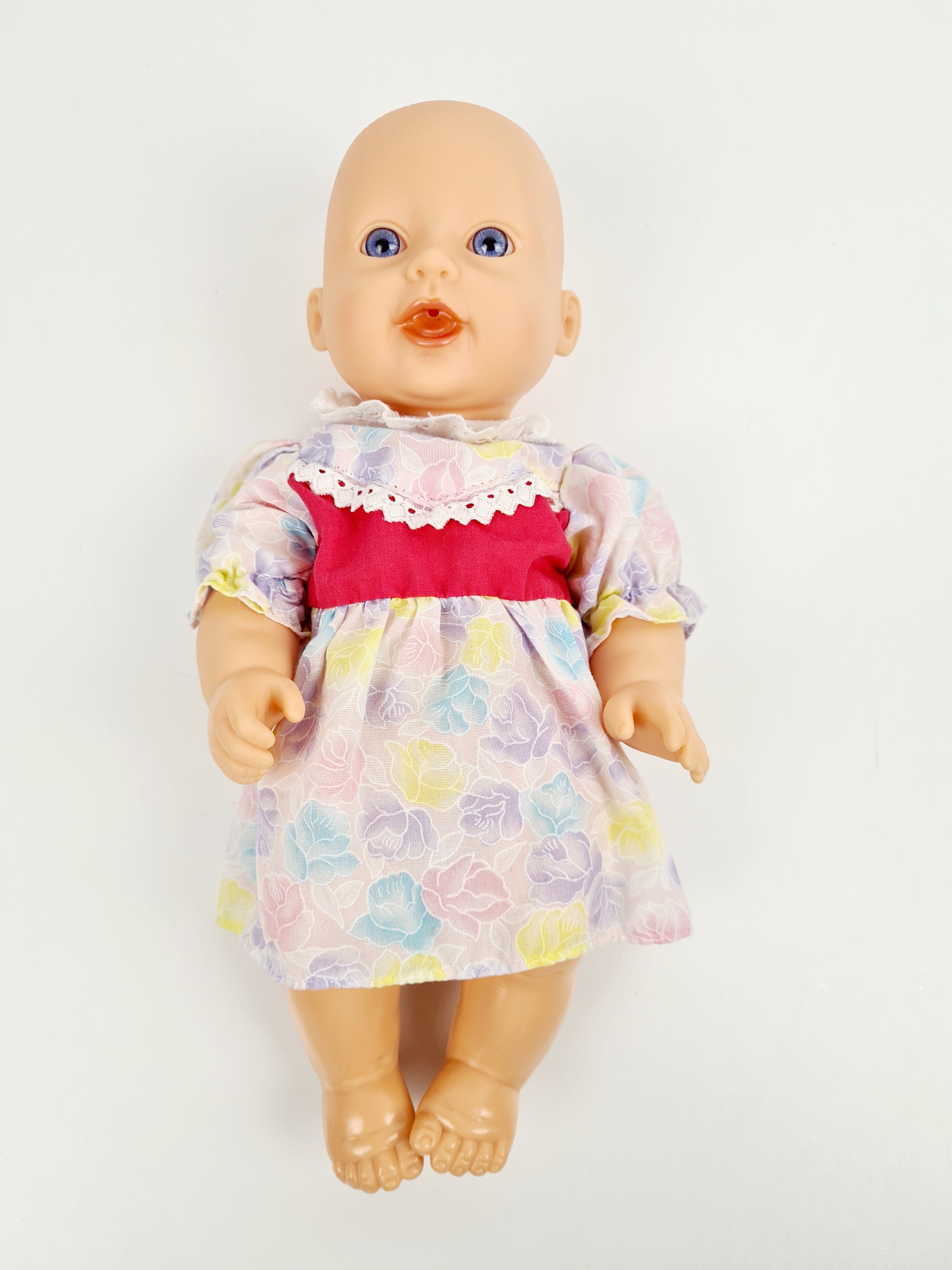 Poupée - Poupon articulé, yeux bleus, robe à fleurs - 30 cm - Photo 1