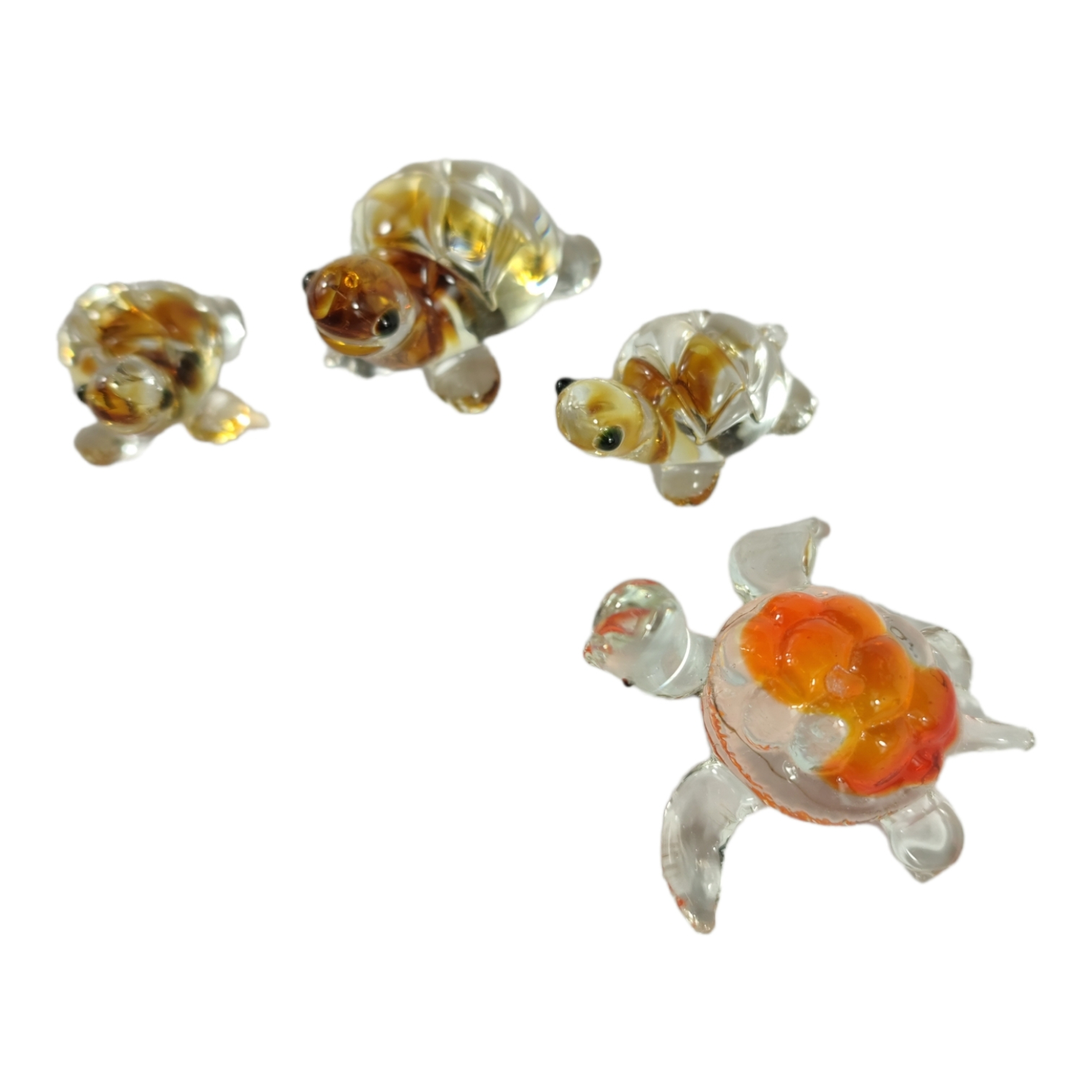 Voir photo 2 de Lot de 4 tortues miniatures en verre soufflé - figurines miniatures Lot de 4 tortues miniatures en verre soufflé - figurines miniatures Très bon état - Vue 2 -