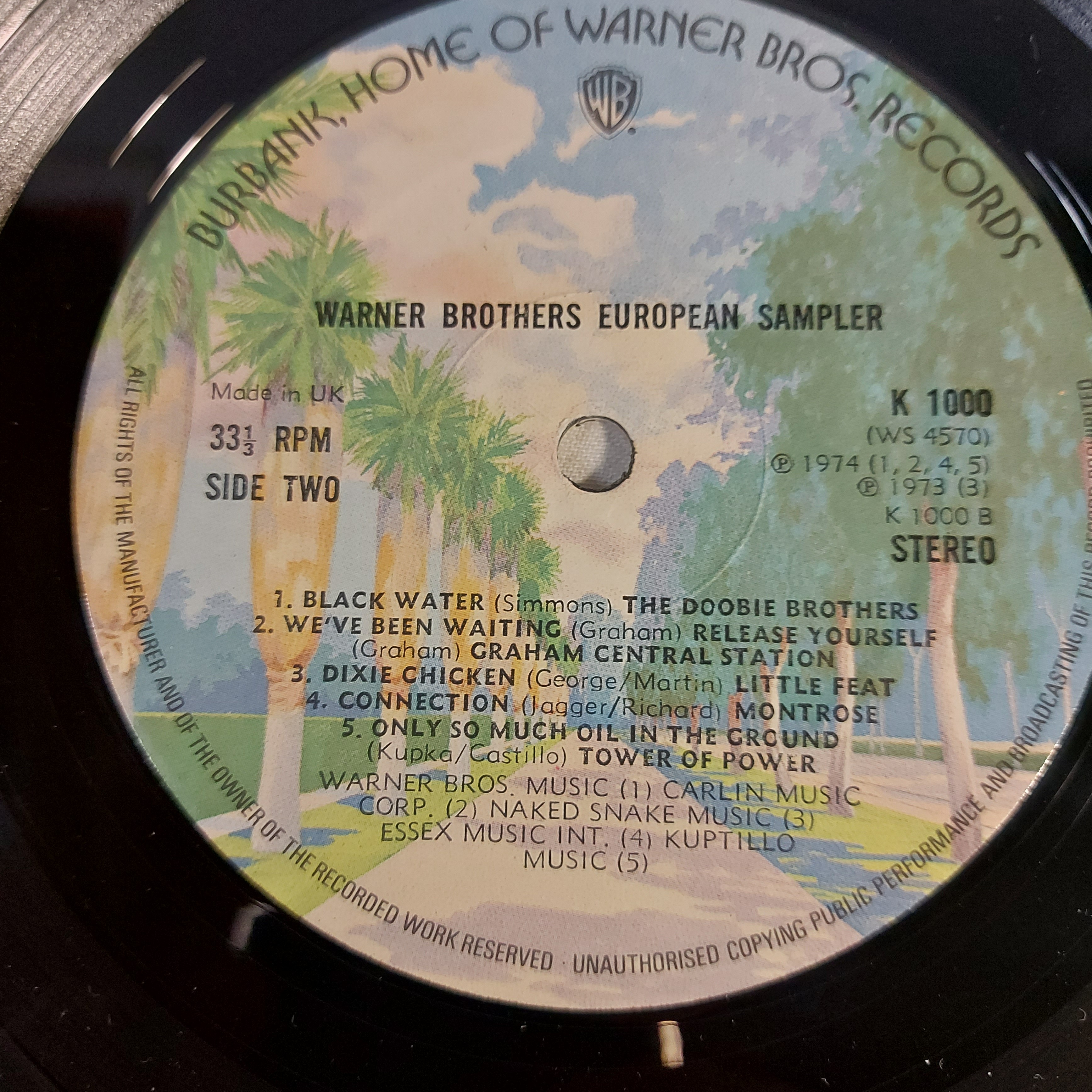 LP The Warner Bros Music Show, version initialement publie au Royaume-Uni Uni, avec The Dooby Brothers - Graham Central Station - Little Heat - Montrose - Tower of Power - Bonaroo, Exemplaire rare, Vinyle 12", 1975 Très bon état - Vue 6 - 