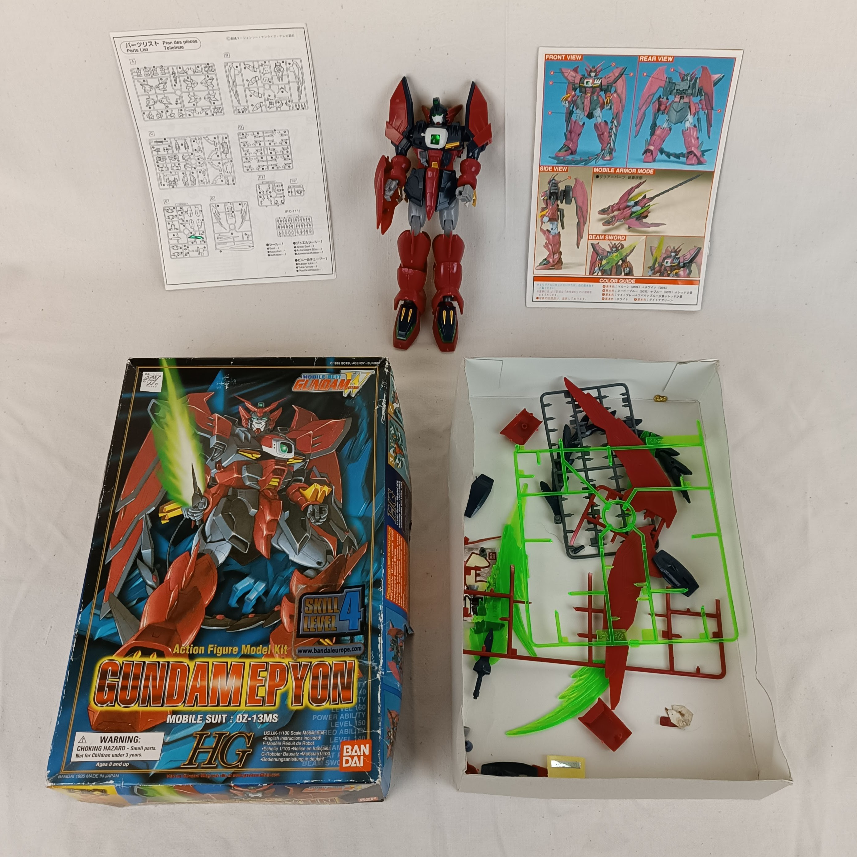 Voir photo 2 de Figurine Bandaï Gundam Epyon #5 Gundam-W série 1/100 #11065, de 1995, déjà montée Figurine Bandaï Gundam Epyon #5 Gundam-W série 1/100 #11065, de 1995, déjà montée État correct - Vue 2 -