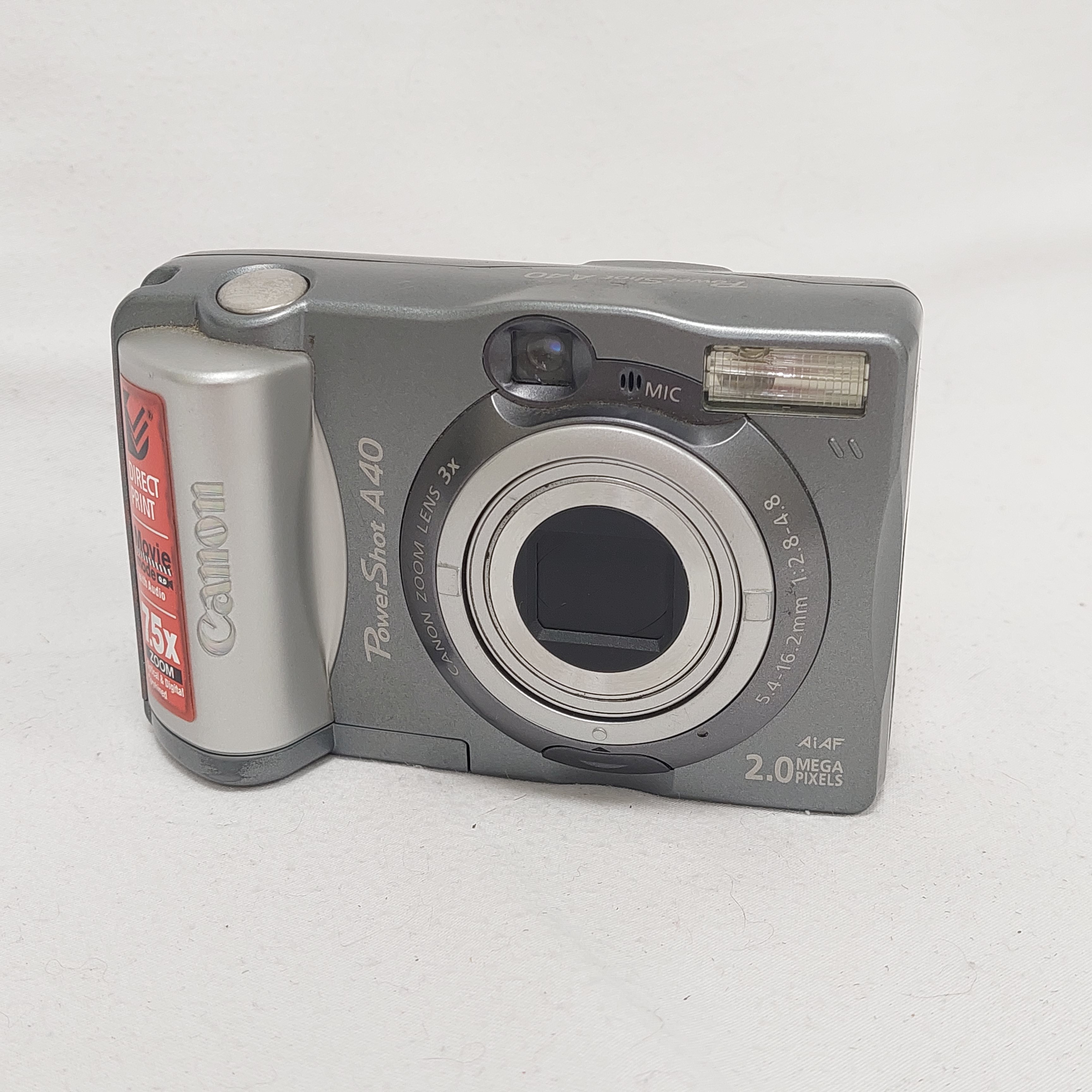 Appareil photo - Canon PowerShot A40 - compartiment pile ok - 2.0 megapixels - gris - Bon état sur Label Emmaüs