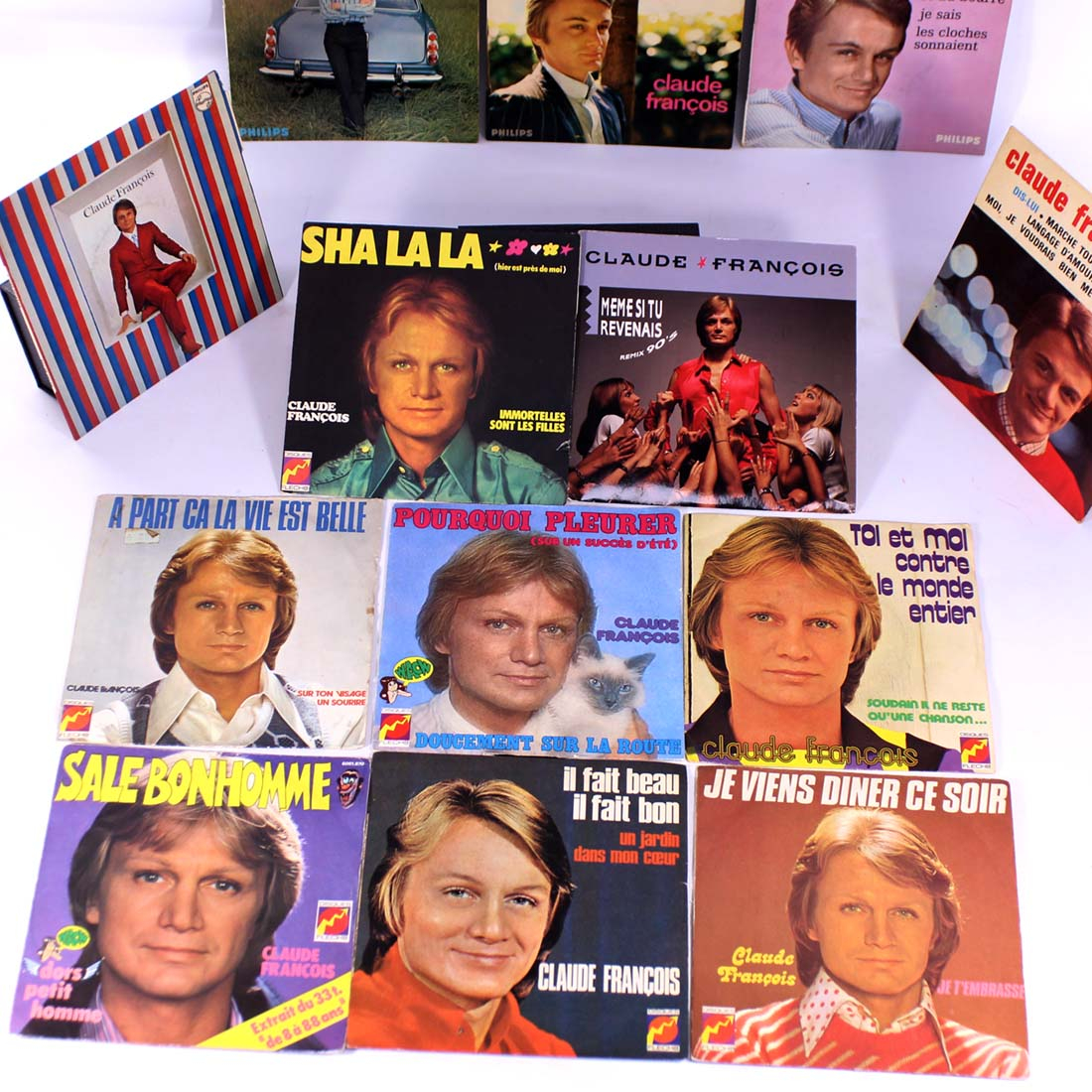 Voir photo 2 de Lot de 13 vinyles 45T de Claude François Lot de 13 vinyles 45T de Claude François État correct - Vue 2 -