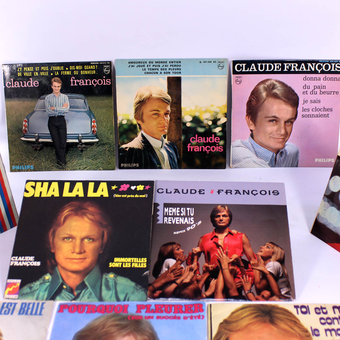 Voir photo 3 de Lot de 13 vinyles 45T de Claude François Lot de 13 vinyles 45T de Claude François État correct - Vue 3 -