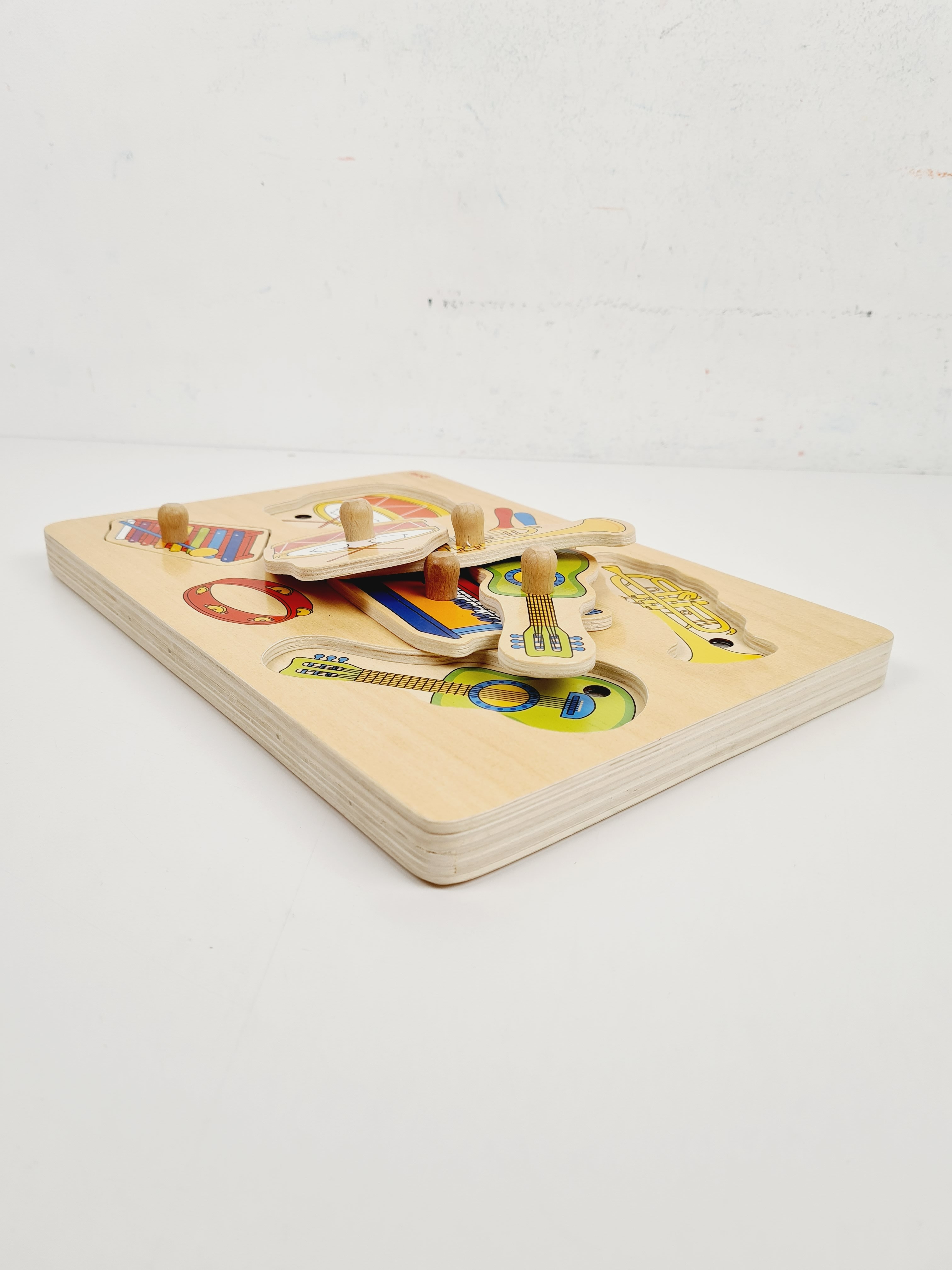 Jouet en bois - Puzzle sonores instruments de musique - Goki - 3 ans + Bon état - Vue 2 - 