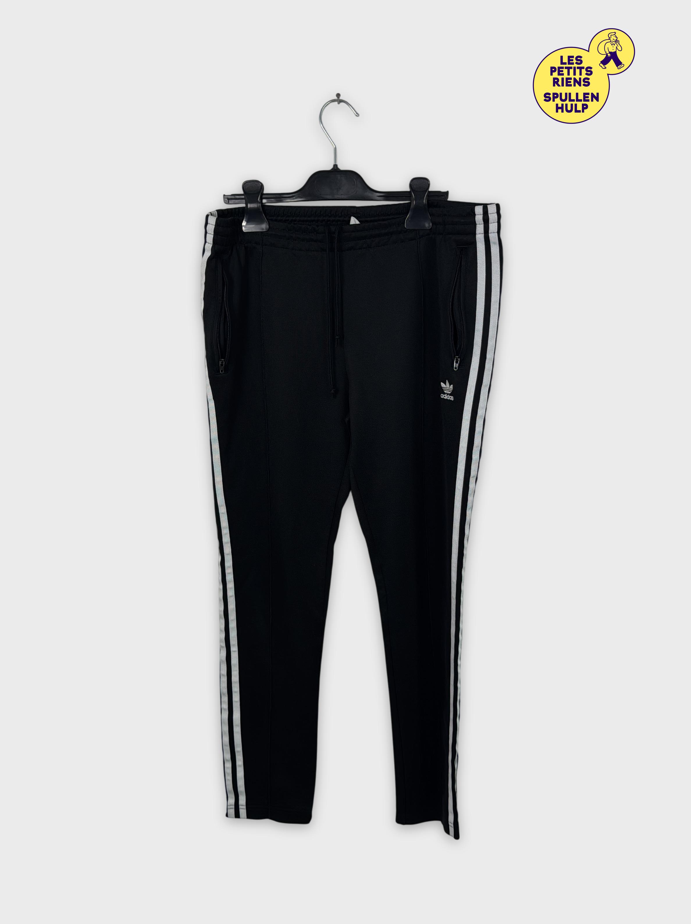 Adidas pantalon de survêtement noir bandes blanches M Très bon état -  reconditionné disponible sur Label Emmaüs