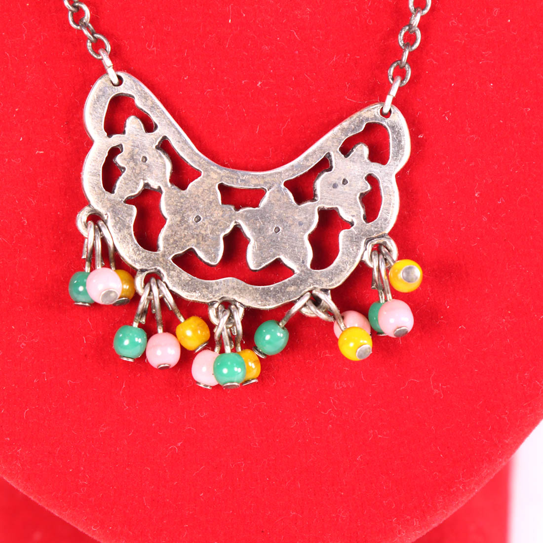 Voir photo 2 de Collier Scooter 30 ans Collier Scooter 30 ans Bon état - Vue 2 -
