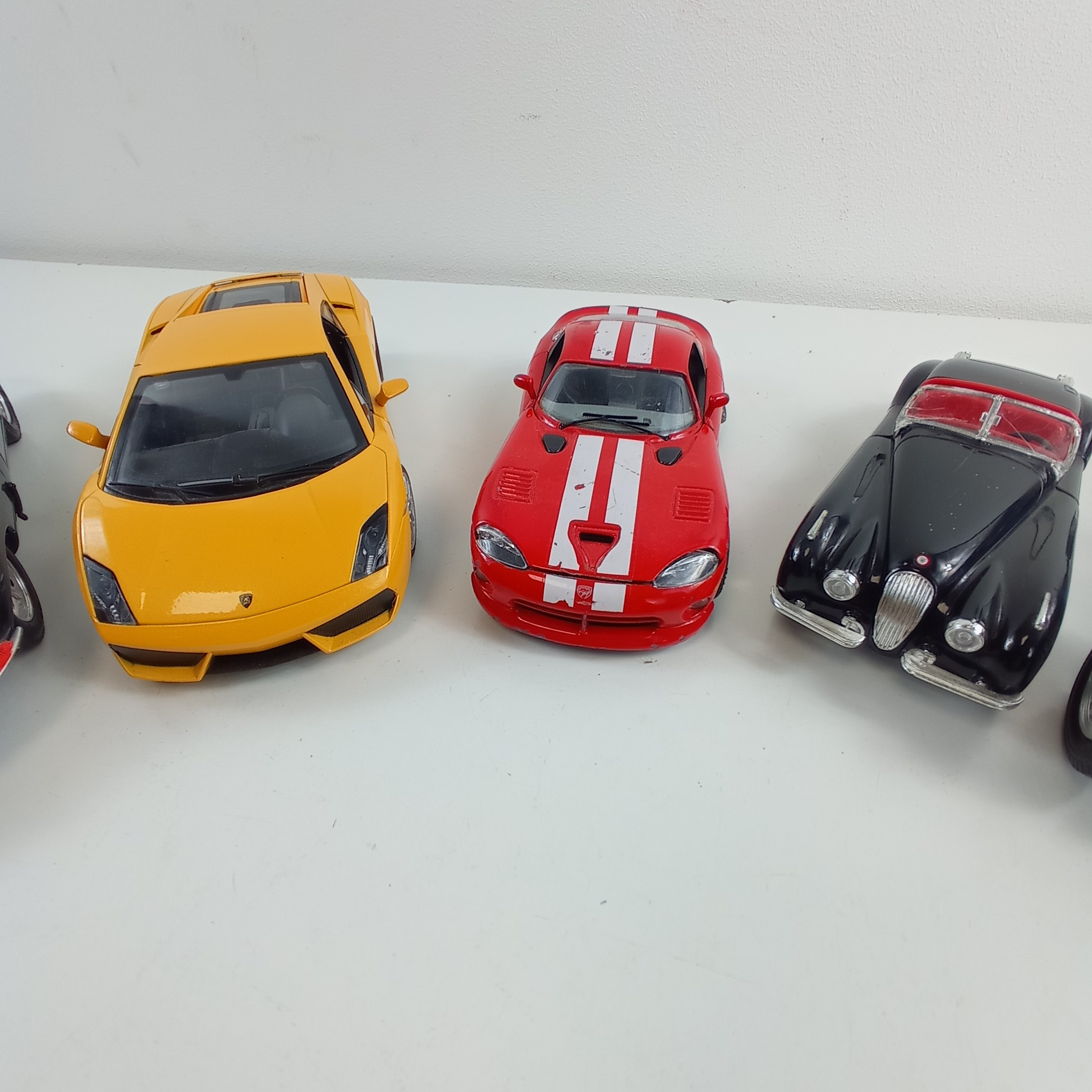 Modèles réduits de 7 voitures de collection marques Burago, Rastar, Maisto Bon état - Vue 3 - 