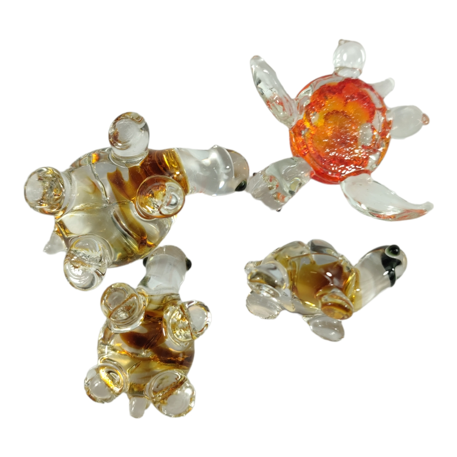 Voir photo 5 de Lot de 4 tortues miniatures en verre soufflé - figurines miniatures Lot de 4 tortues miniatures en verre soufflé - figurines miniatures Très bon état - Vue 5 -