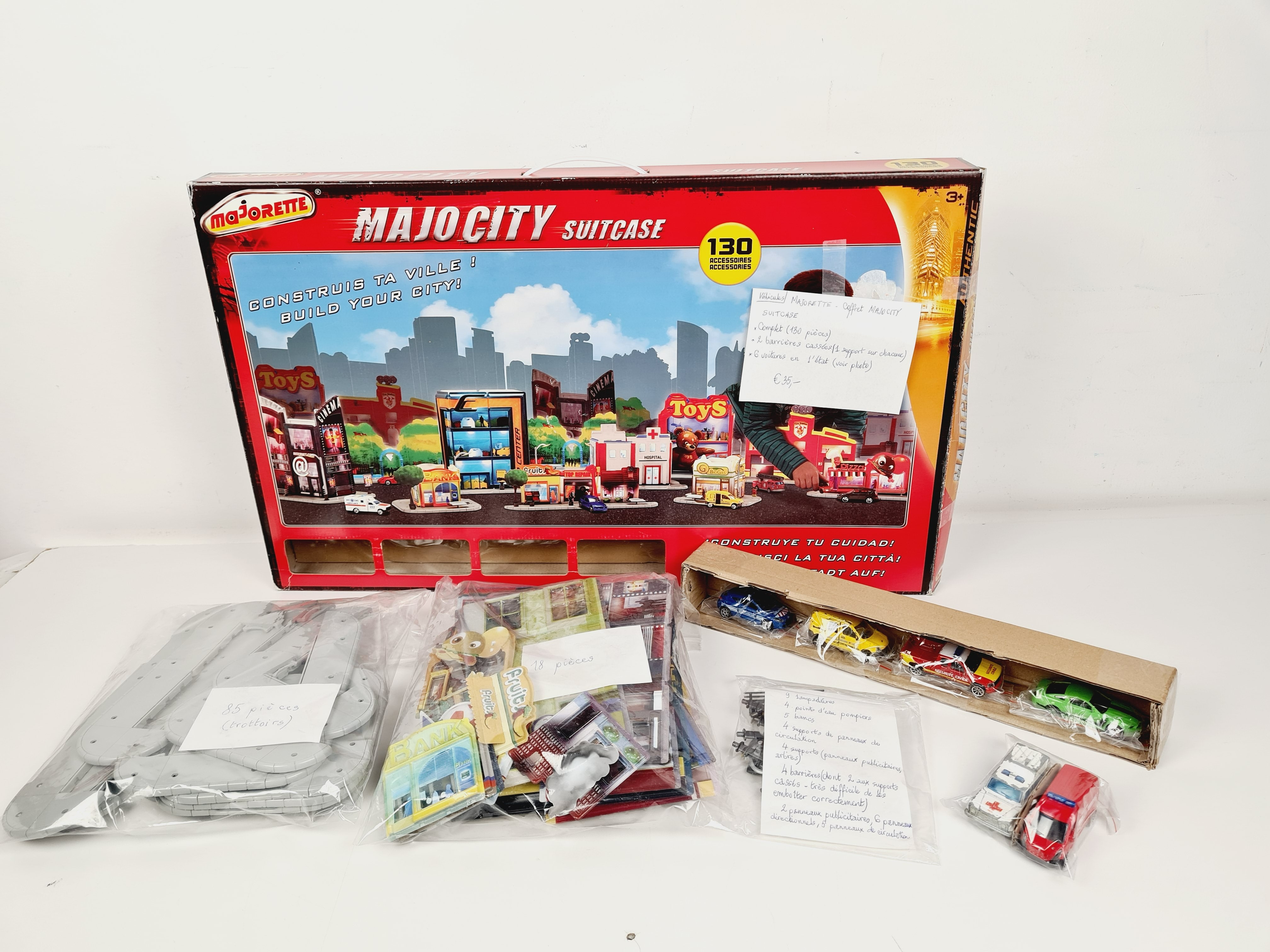 Voir photo 2 de Véhicules - Coffret Majo City Suit Case 130 pièces - Majorette - 3 ans + Véhicules - Coffret Majo City Suit Case 130 pièces - Majorette - 3 ans + Bon état - Vue 2 -