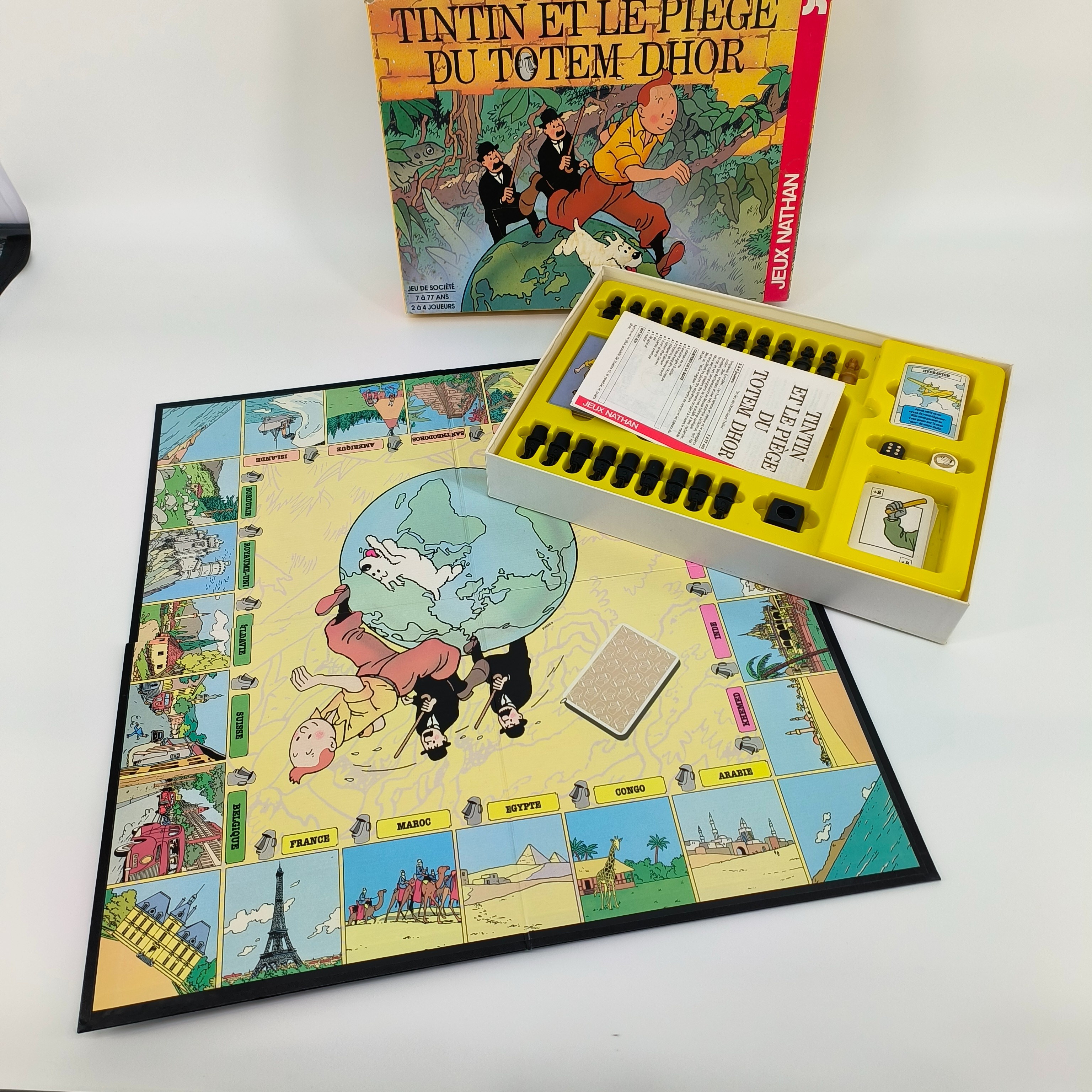 Voir photo 4 de Jeu de société-"Tintin et le piège du totem dhor"- Nathan-à partir de 7 ans Jeu de société-"Tintin et le piège du totem dhor"- Nathan-à partir de 7 ans Bon état - Vue 4 -