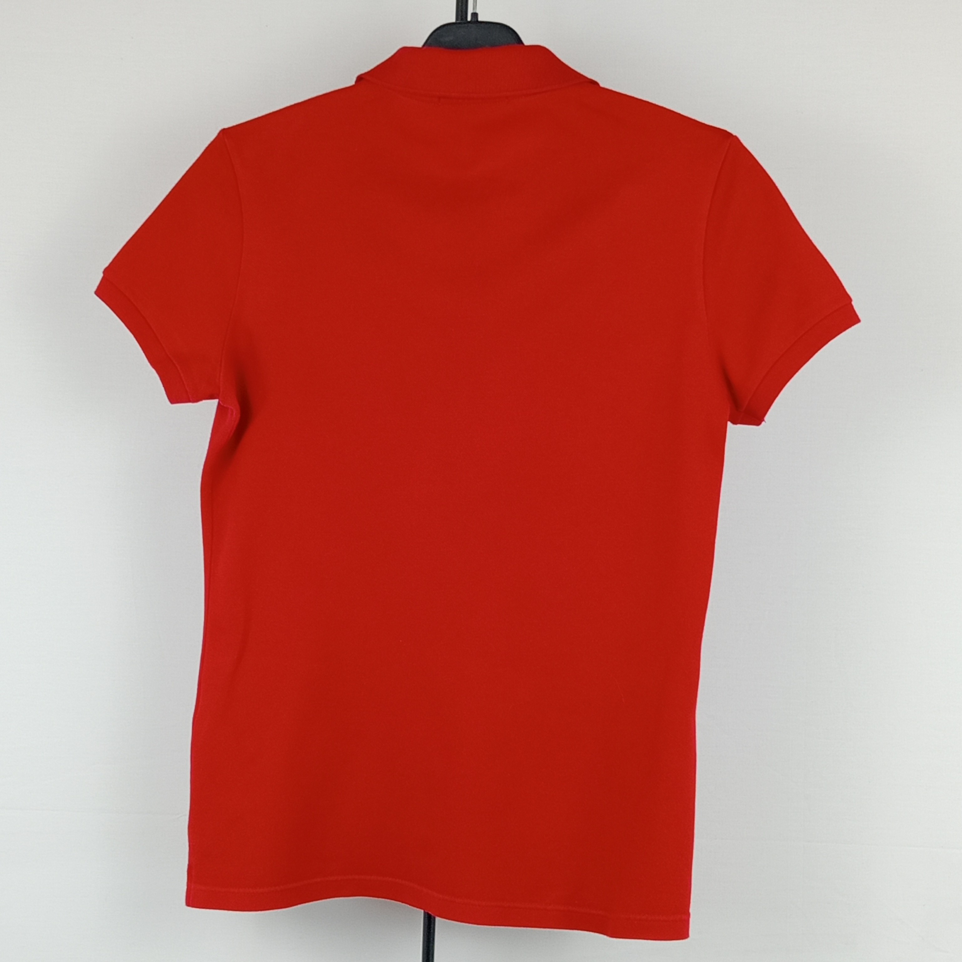 Polo homme de la marque Lacoste col boutonné manches courtes de couleur rouge taille M (40) - Photo 1