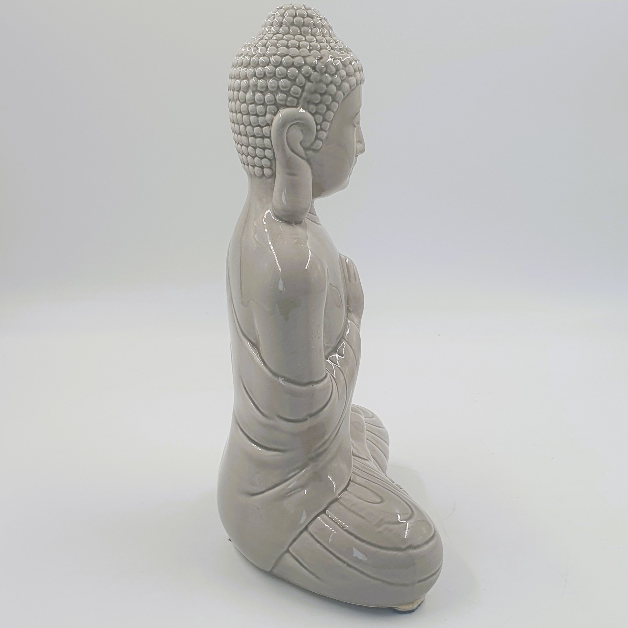 Petite statue Bouddha en céramique - Photo 1