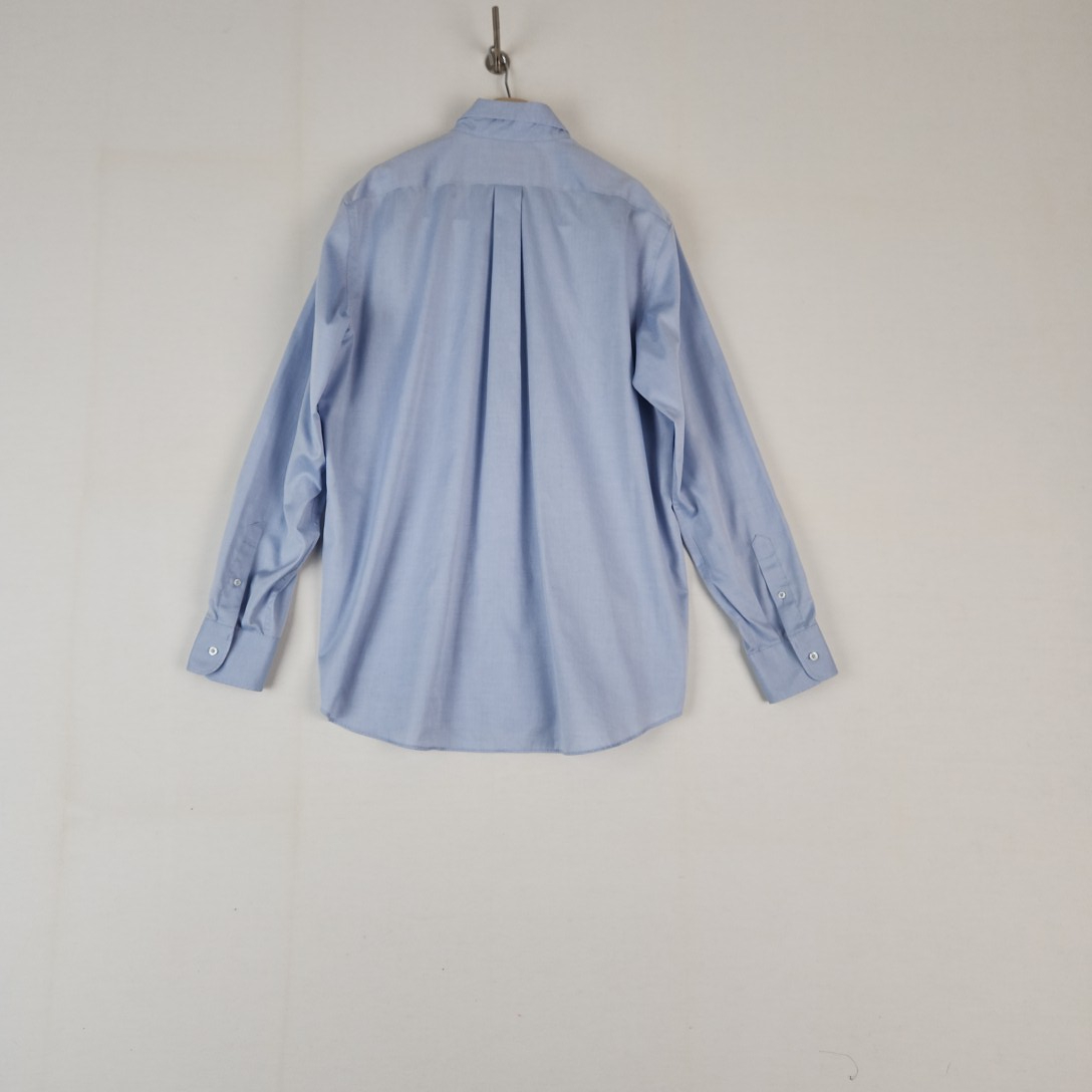 Voir photo 3 de Cyrillus - chemise bleue en coton - Taille 42 mesure carrure poitrine = 62 cm – longueur= 82 cm Cyrillus - chemise bleue en coton - Taille 42 mesure carrure poitrine = 62 cm – longueur= 82 cm - Vue 3 -