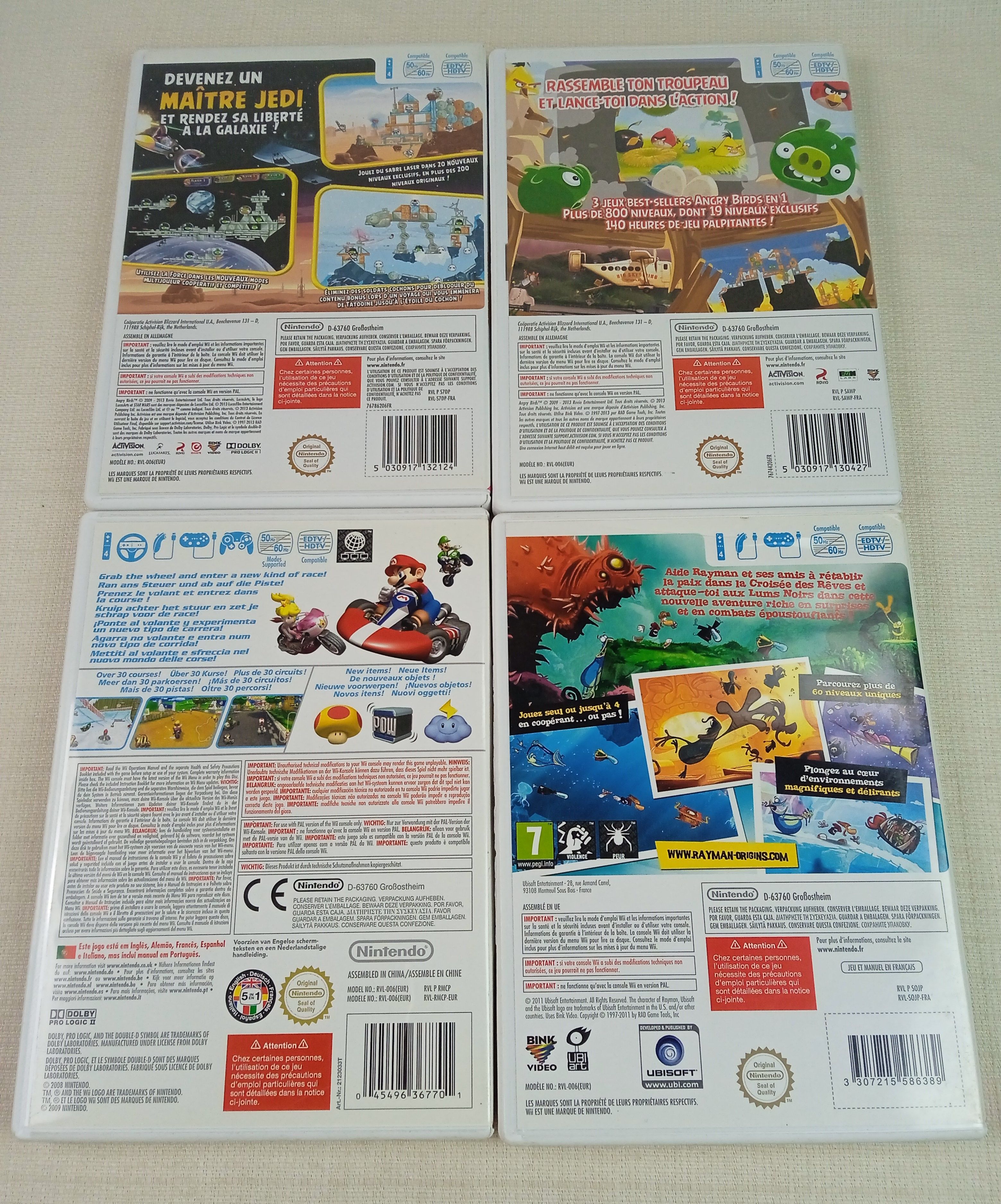 Lot de 4 jeux Nintendo Wii : Angry Birds Trilogy, Angry birds Star Wars, Rayman Origins, Mariokart Très bon état - Vue 2 - 