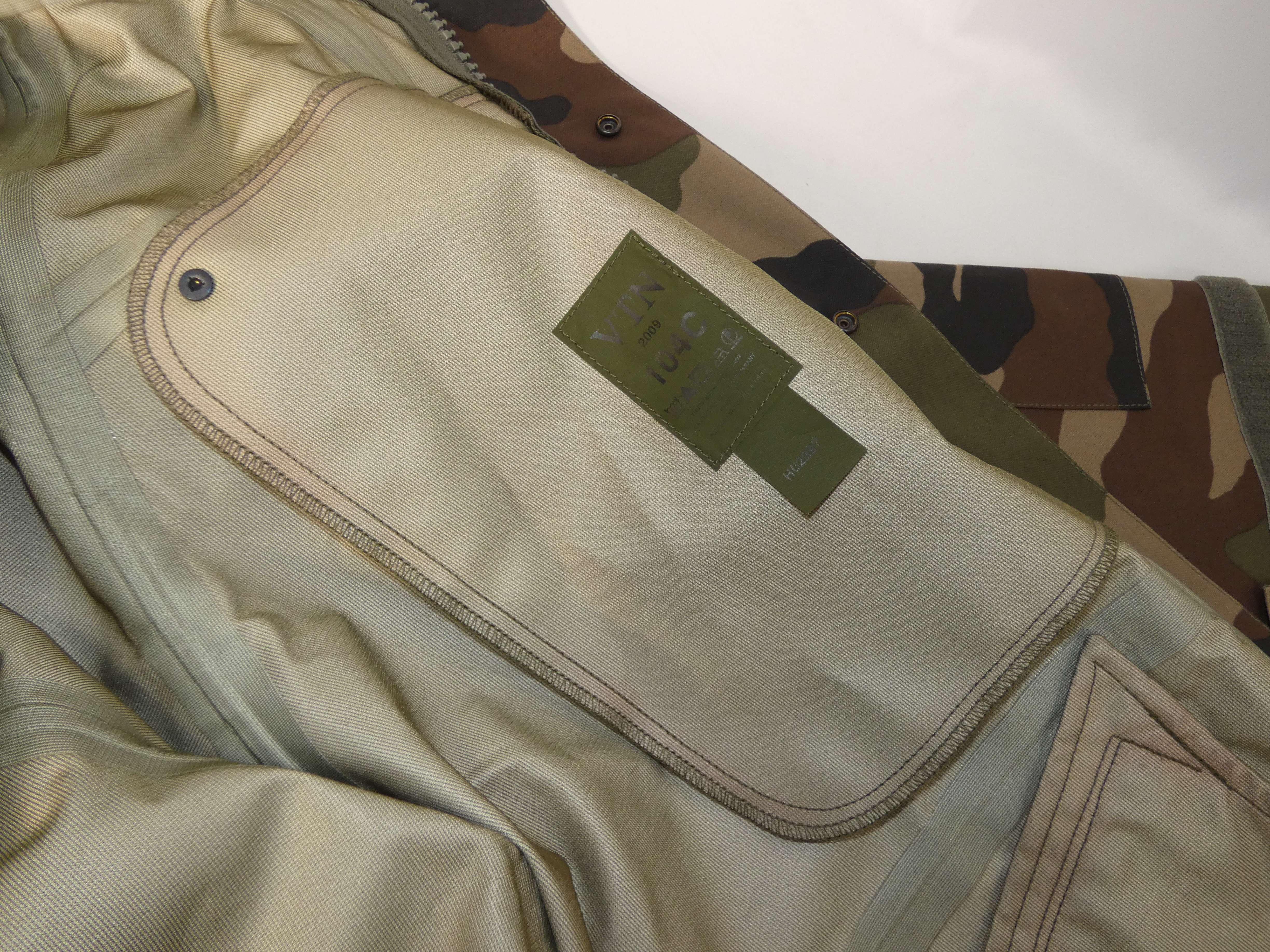 Voir photo 11 de Veste légère de terrain avec camouflage VTN T. L Veste légère de terrain avec camouflage VTN T. L Comme neuf - Vue 11 -