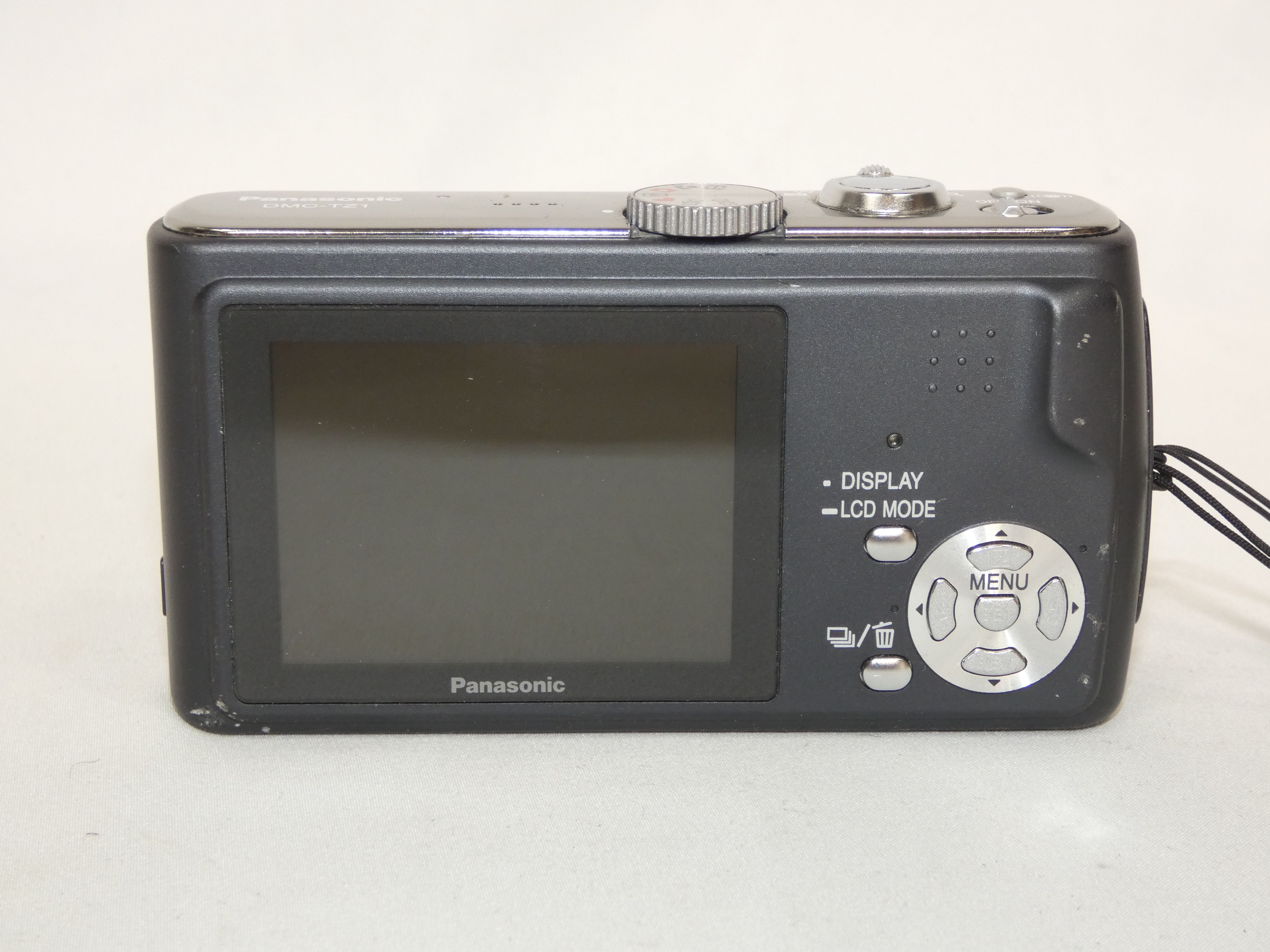 Appareil photo numérique PANASONIC DMC-TZ1 (pour pièces) Très bon état - Vue 5 - 