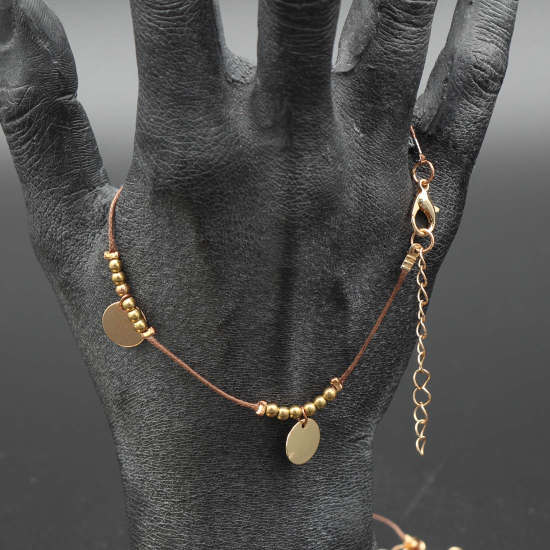 Sautoir bracelet bague boucles d'oreille en métal doré Bon état - Vue 6 - 