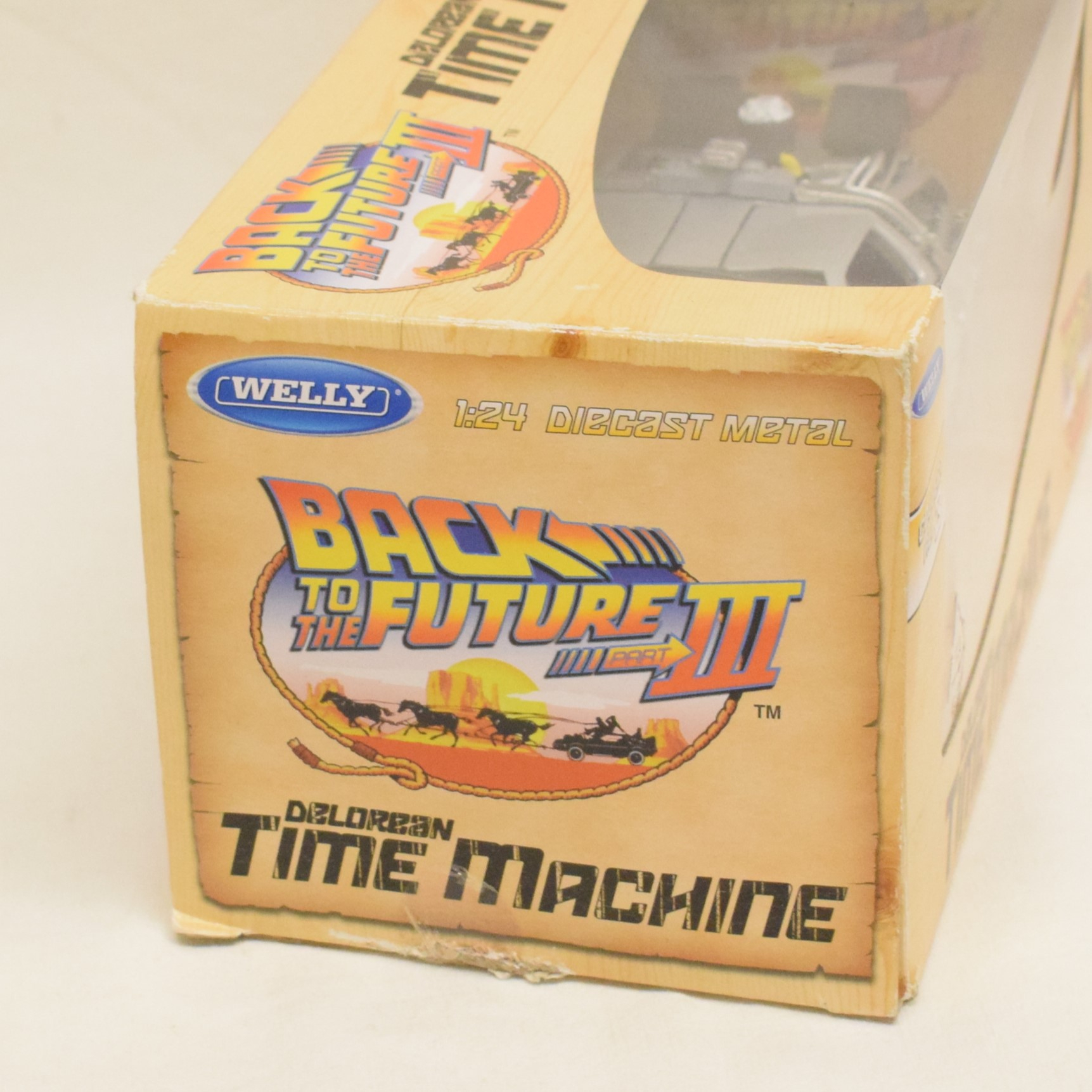 Voiture Dolorean retour vers le futur III au 1:24 par Welly État correct - Vue 7 - 