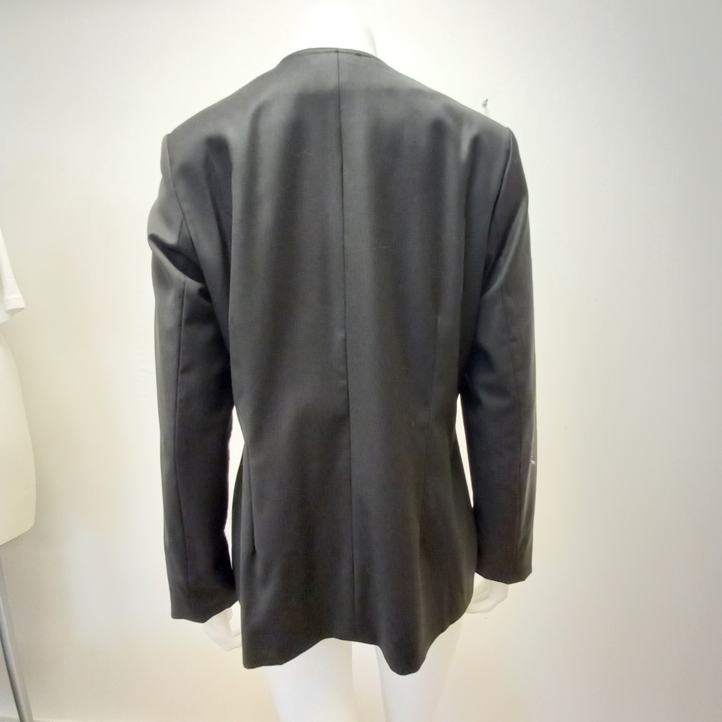 Voir photo 2 de Veste noire femme. Longchamp T.42 Veste noire femme. Longchamp T.42 - Vue 2 -