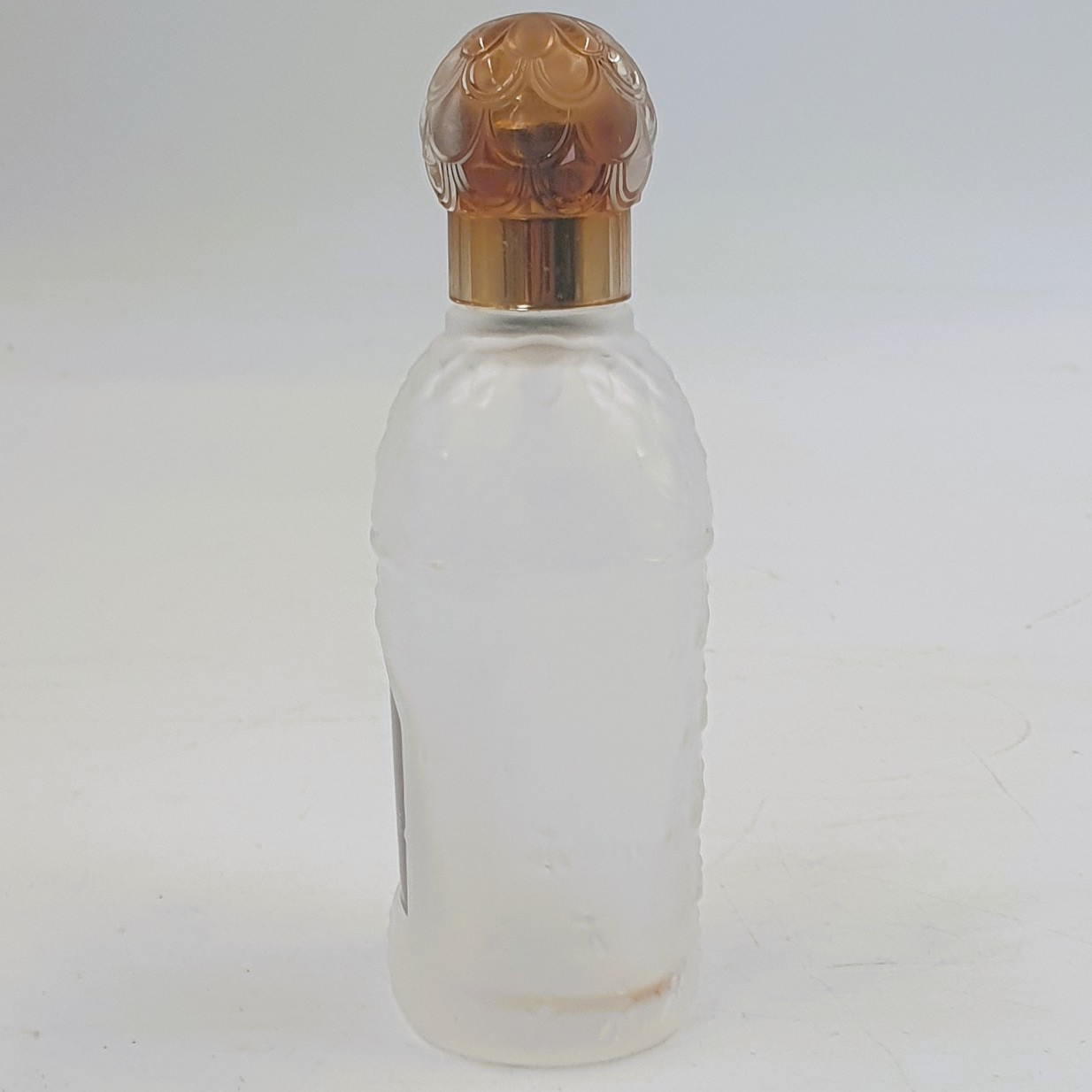 Flacon d'eau de toilette vide Insolence par Guerlain - Photo 1