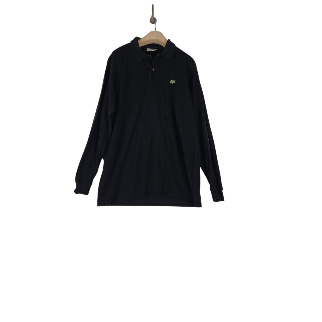 Lacoste - polo noir en coton - Taille 5/44 mesures Carrure Poitrine 46 cm Longueur= 74 cm Bon état -  reconditionné disponible sur Label Emmaüs