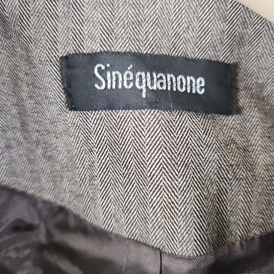 Voir photo 4 de Sinéquanone - Veste taupe en polyester - Taille 38/40 Sinéquanone - Veste taupe en polyester - Taille 38/40 Très bon état - Vue 4 -