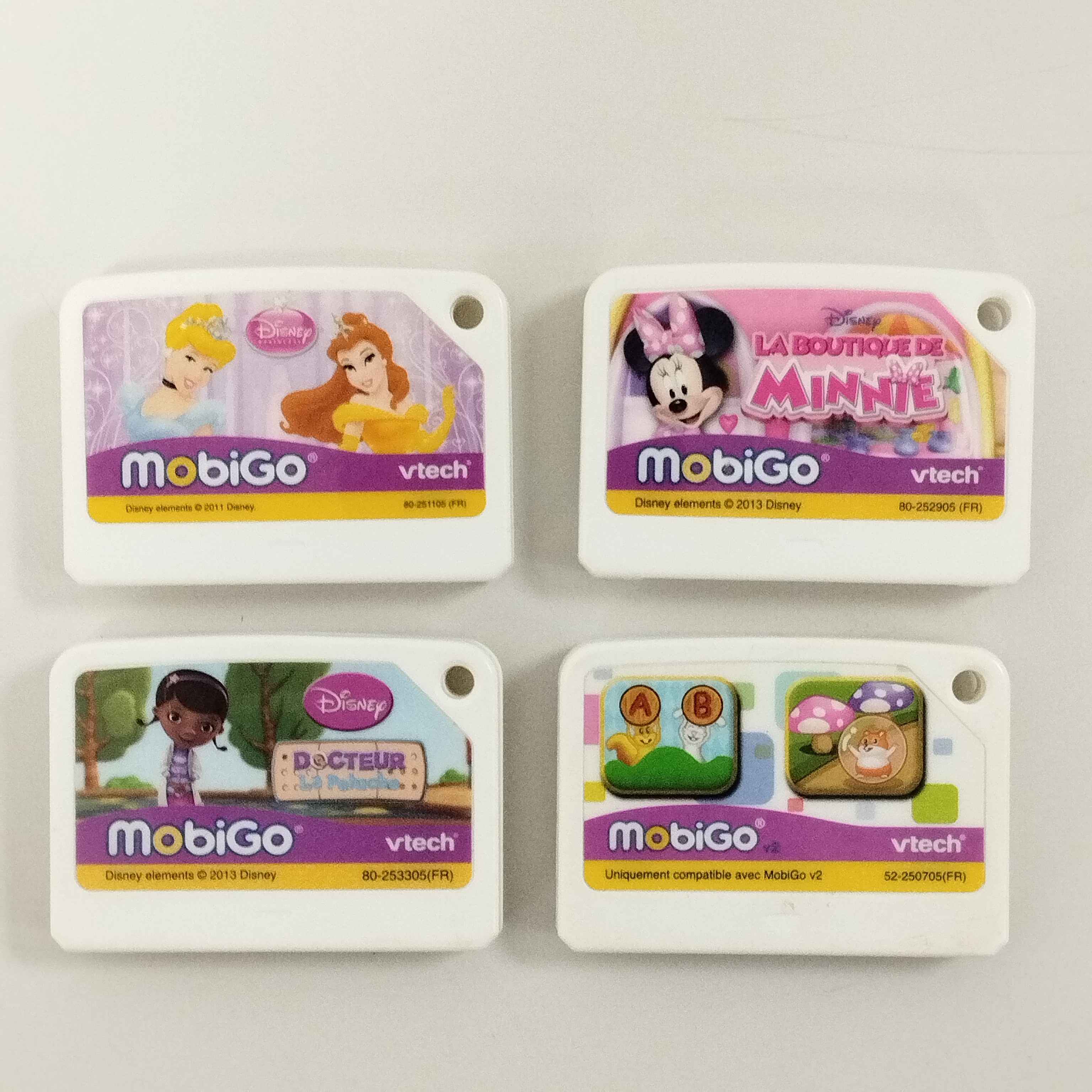 Console portative pour enfants Mobigo V2 (Vtech) + 4 jeux Très bon état - Vue 5 - 