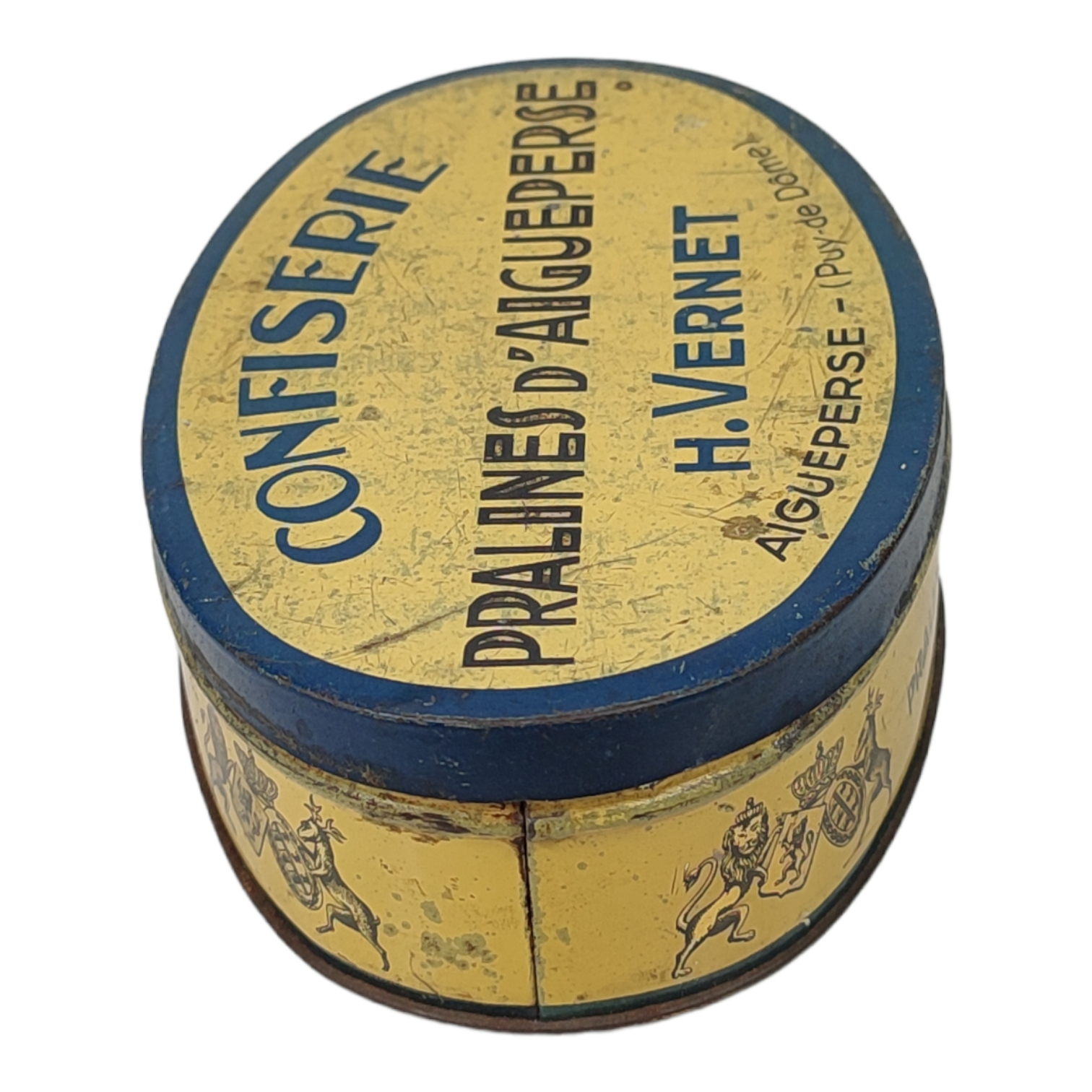 Ancienne boîte en tôle peinte - confiserie pralines d'Aigueperse Ancienne boîte en tôle peinte - confiserie pralines d'Aigueperse