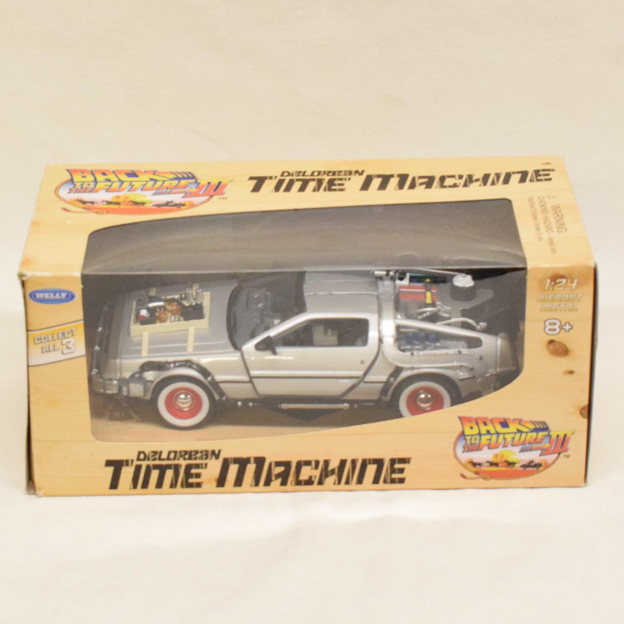 Voiture Dolorean retour vers le futur III au 1:24 par Welly État correct - Vue 6 - 