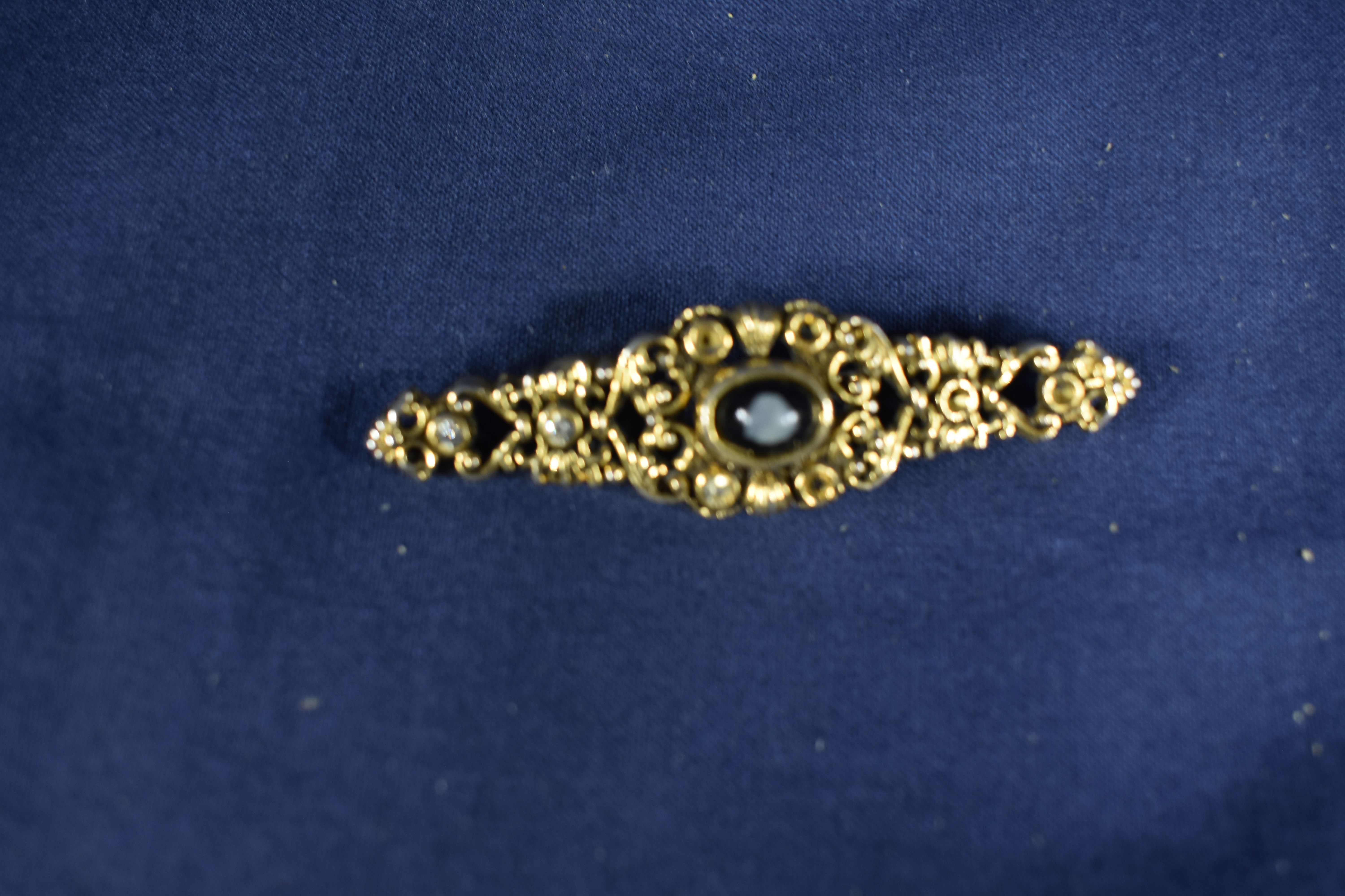 3 boucles plus 1 décoration de ceinture.  - Vue 6 - 