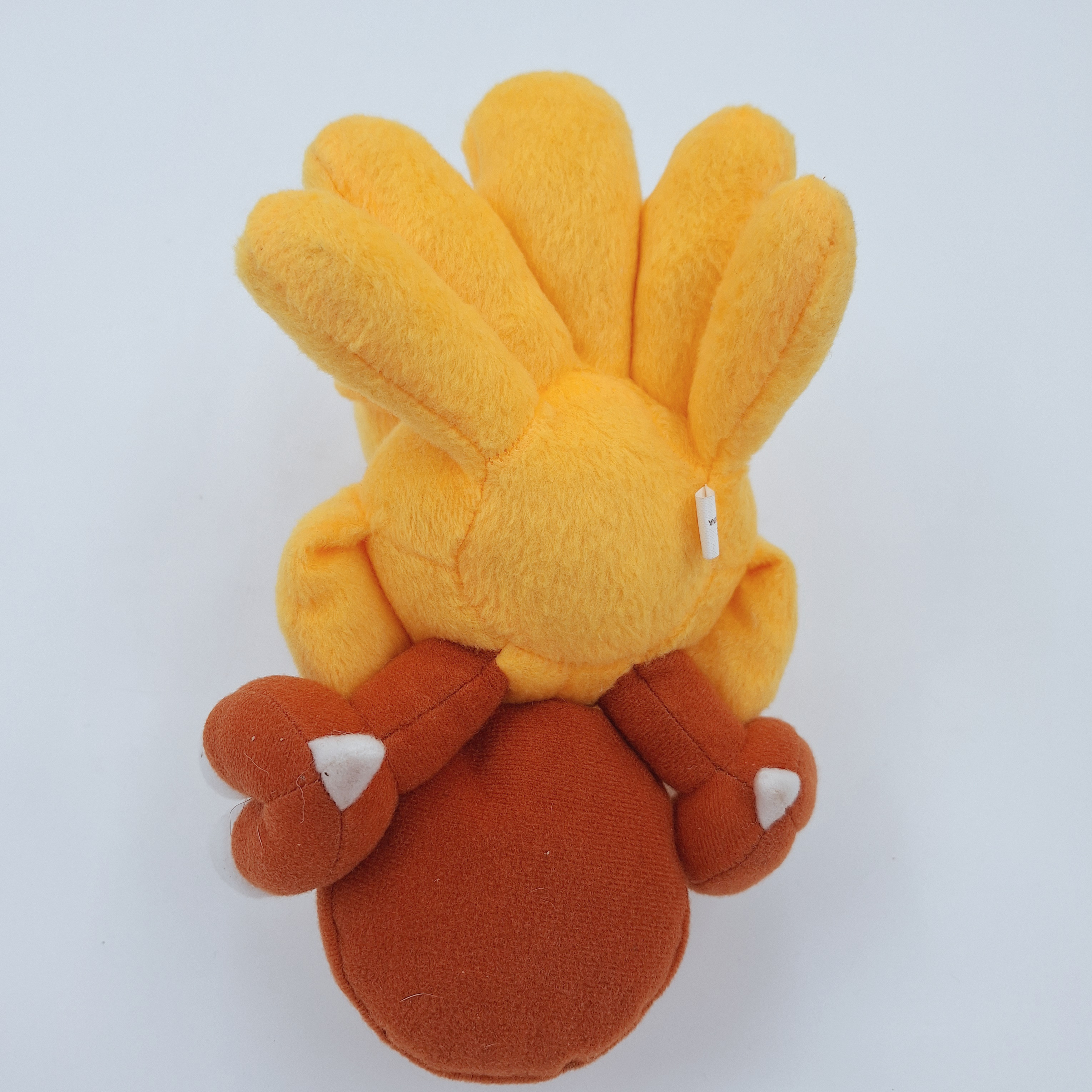 Peluche Chocobo « 25 th Anniversary » de la saga de jeux vidéo Final fantasy de la marque Square Enix. Très bon état - Vue 6 - 