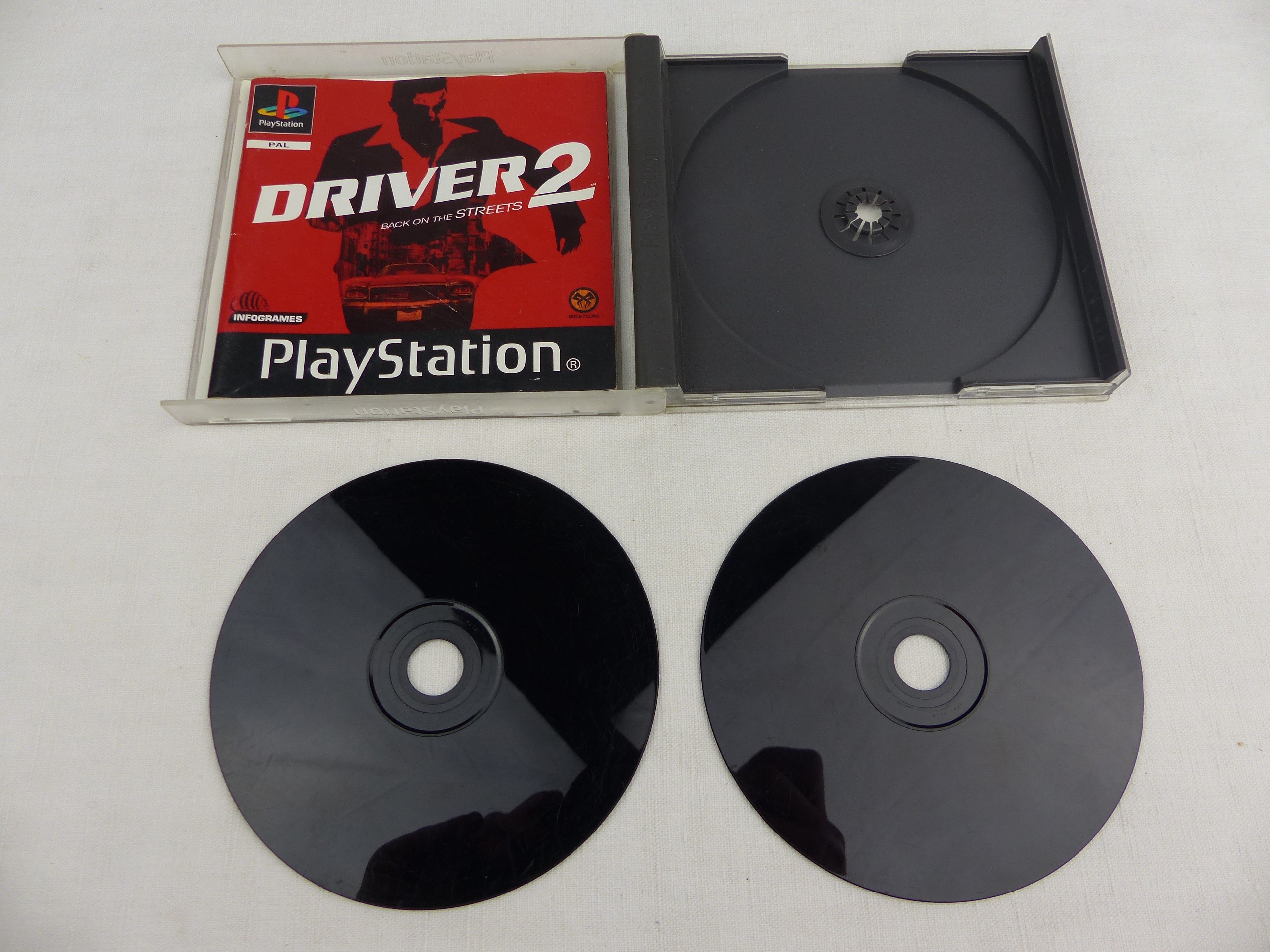 Voir photo 6 de Driver 2 Back On The Streets PS1 PlayStation Complet 2 Disques PAL FR Driver 2 Back On The Streets PS1 PlayStation Complet 2 Disques PAL FR État correct - Vue 6 -
