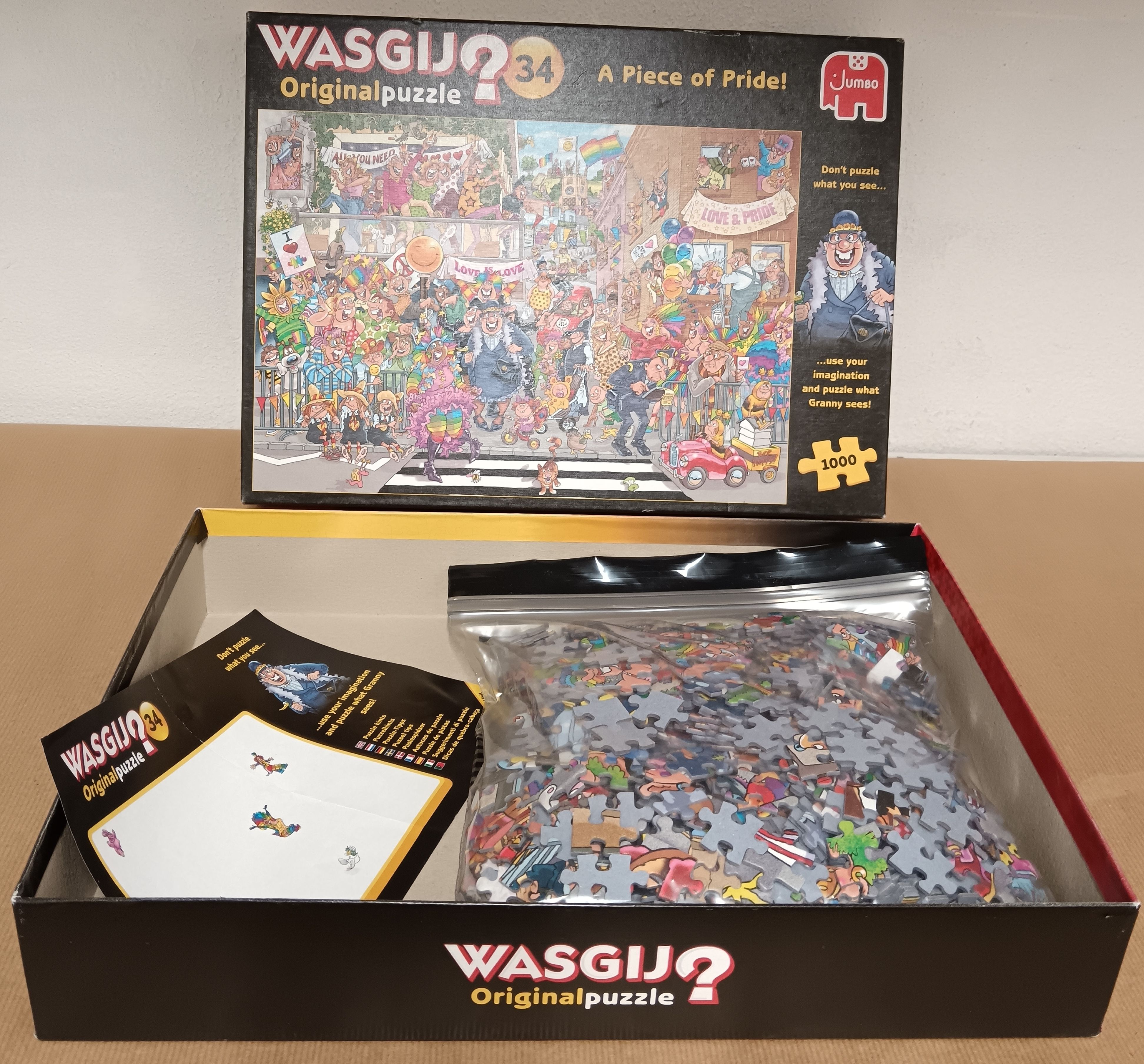 Puzzle de 1000 pièces ''La parade de la fierté'' de la marque Jumbo Bon état - Vue 2 - 