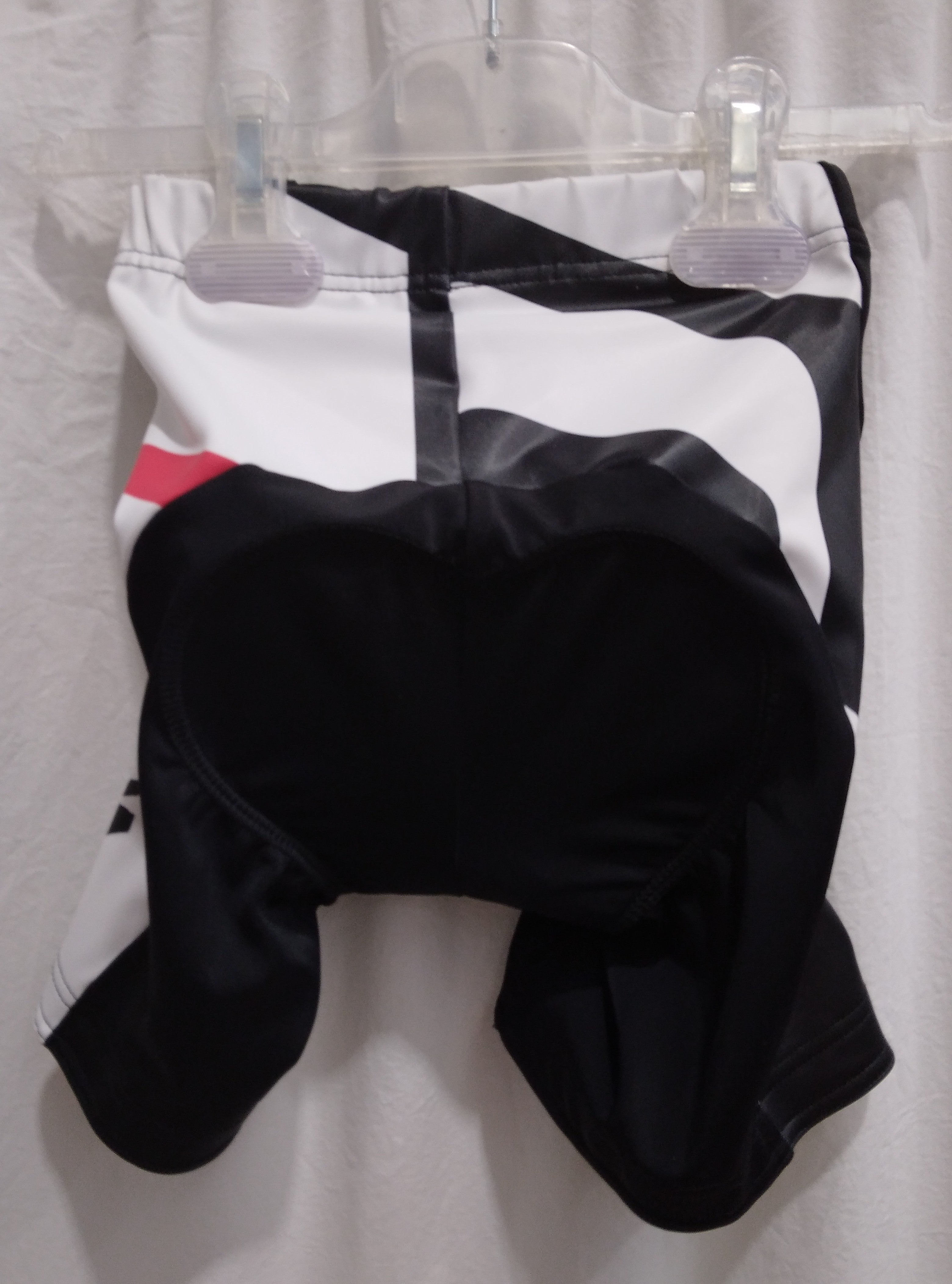 Voir photo 2 de Short de cyclisme noir, blanc & rouge, "RBX Comp Youth", Spécialized - 7/8 ans Short de cyclisme noir, blanc & rouge, "RBX Comp Youth", Spécialized - 7/8 ans Comme neuf - Vue 2 -