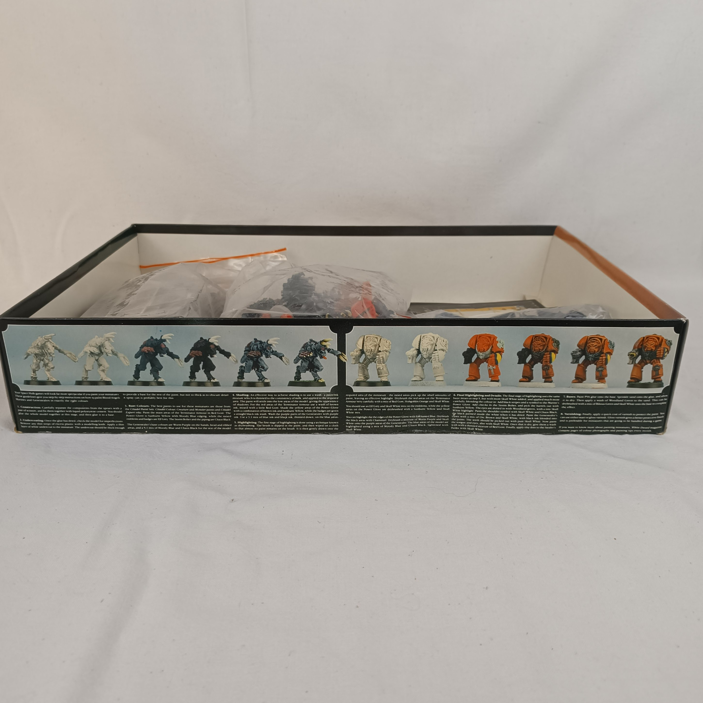 Voir photo 23 de Jeu de société "Space Hulk" - Warhammer 40K, première édition de 1989, par Games Workshop, figurines peintes Jeu de société "Space Hulk" - Warhammer 40K, première édition de 1989, par Games Workshop, figurines peintes État correct - Vue 23 -