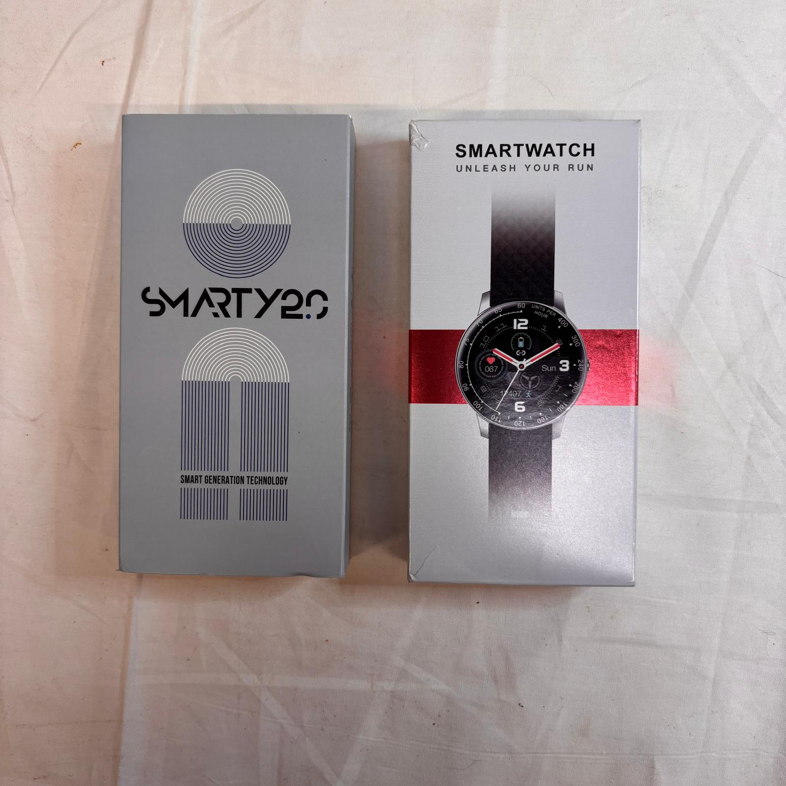 Voir photo 4 de Montre connectée Smarty 2.0 Warm up - SW008G Orange Montre connectée Smarty 2.0 Warm up - SW008G Orange Très bon état - Vue 4 -