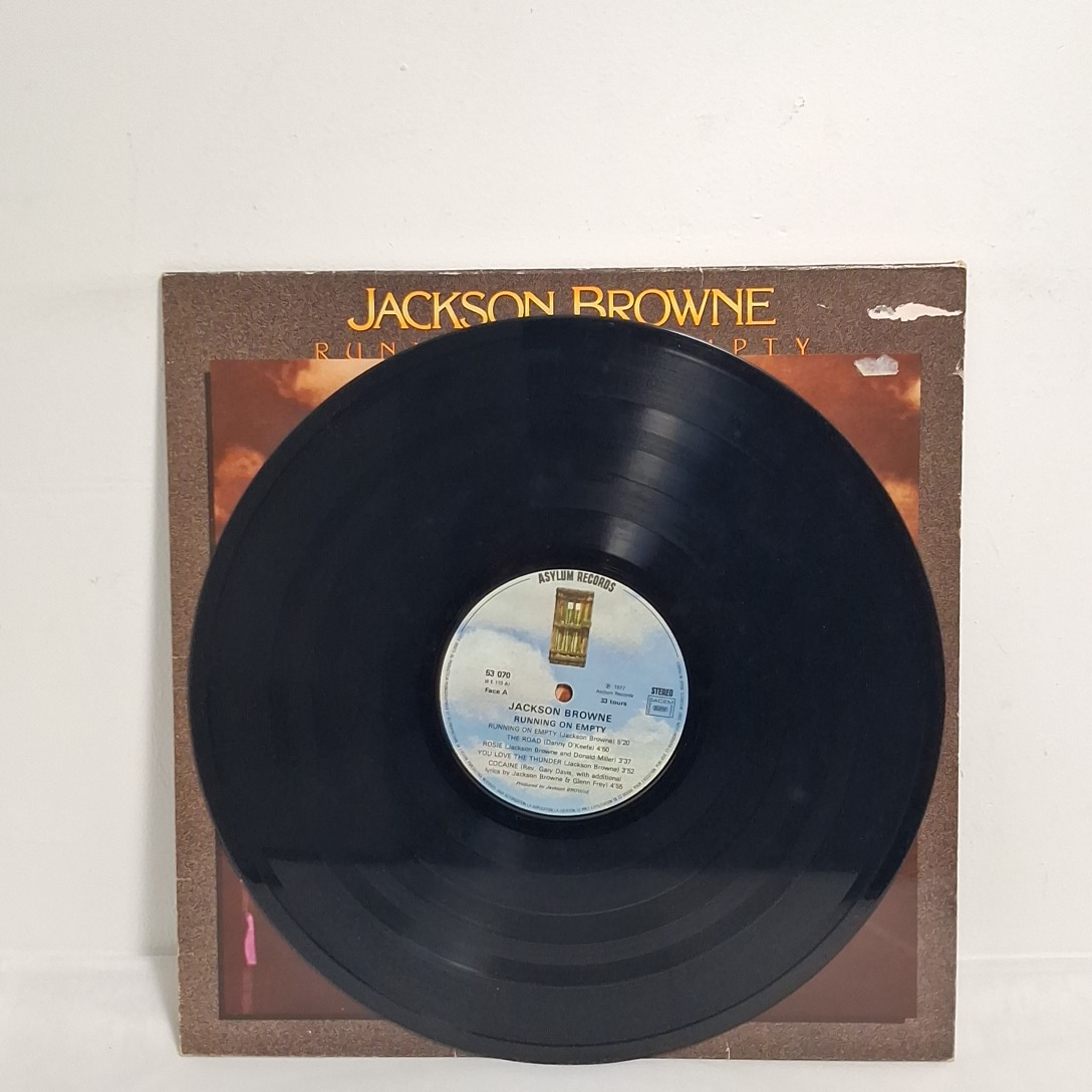 Voir photo 2 de Album Jackson Browne " running on empty" en vinyle 33t Album Jackson Browne " running on empty" en vinyle 33t État correct - Vue 2 -